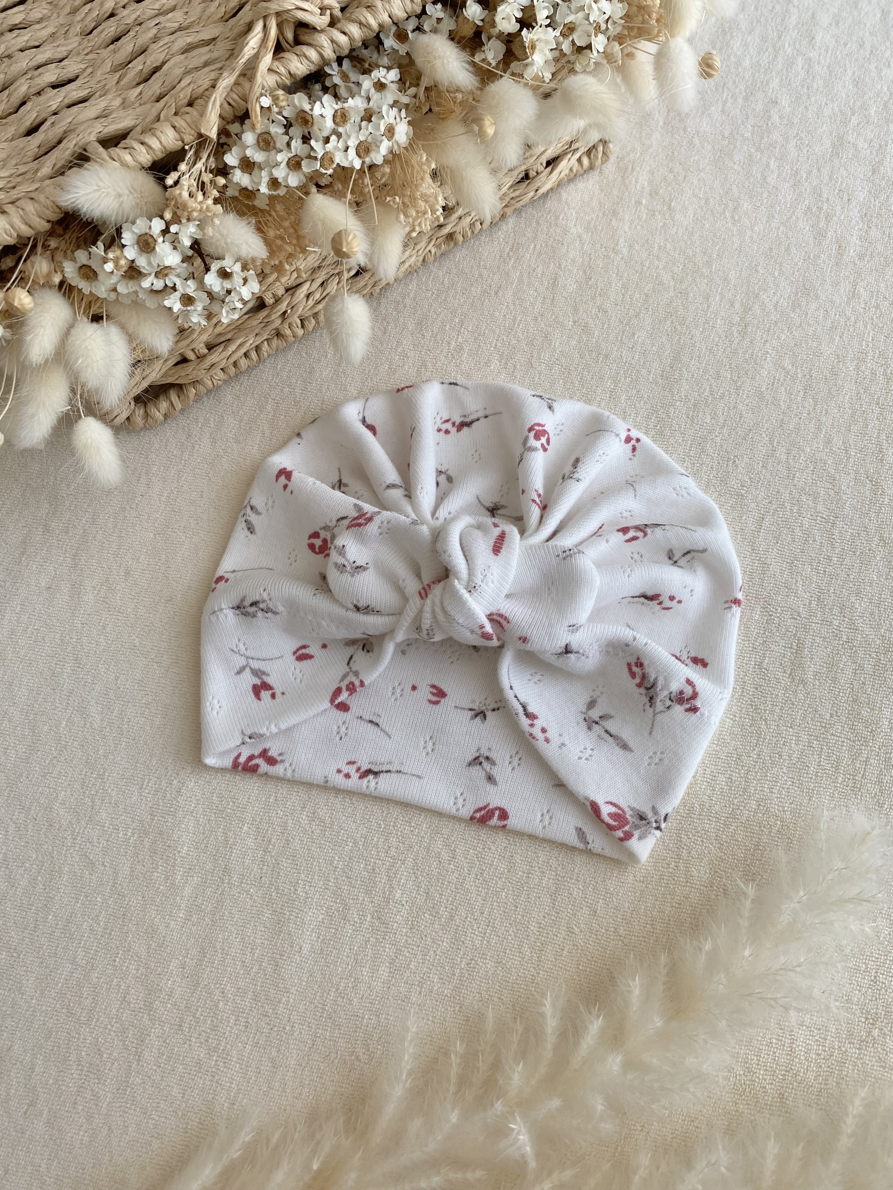 Turban fleuri blanc ajouré
