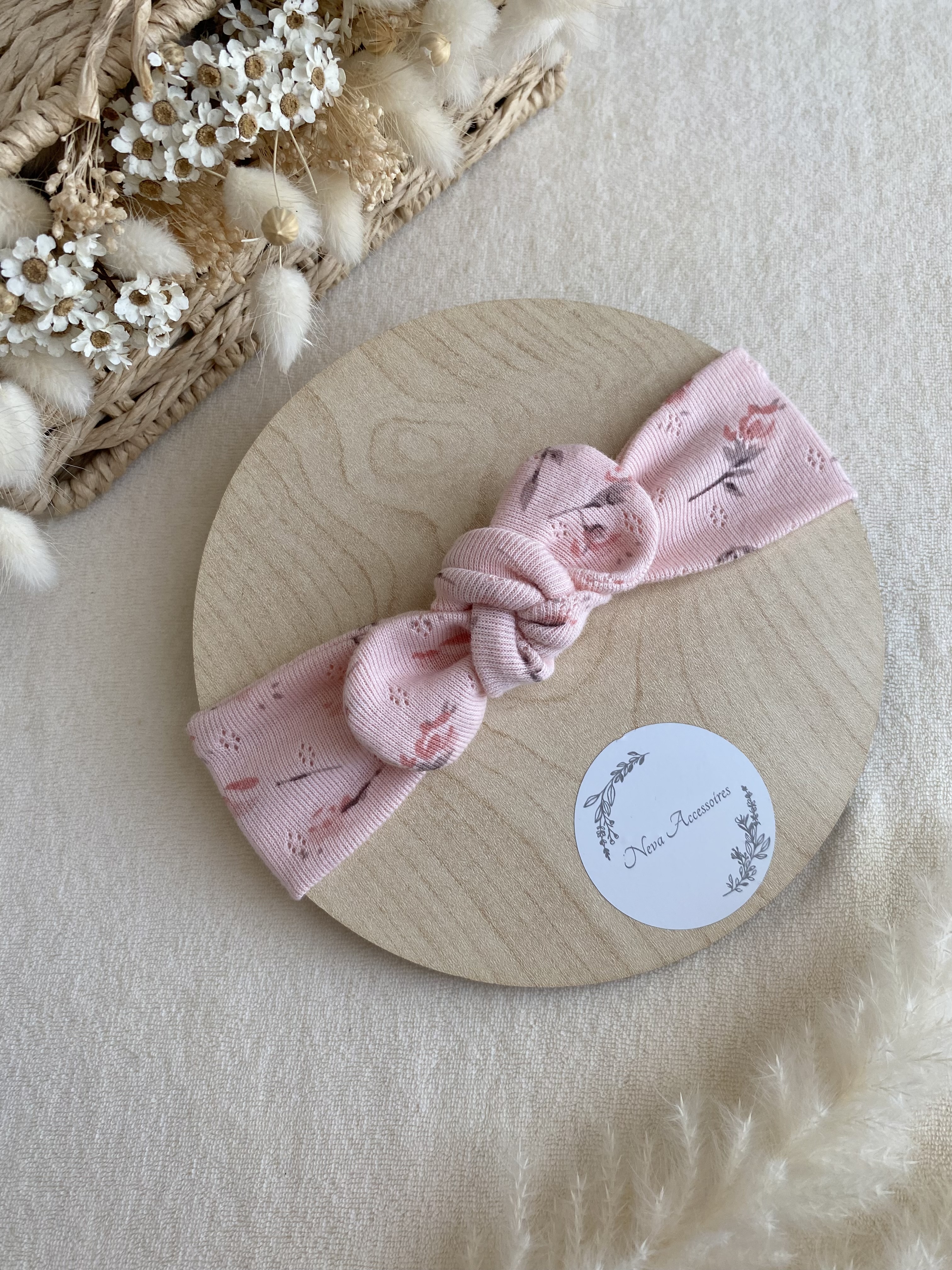 Bandeau rose saumon ajouré