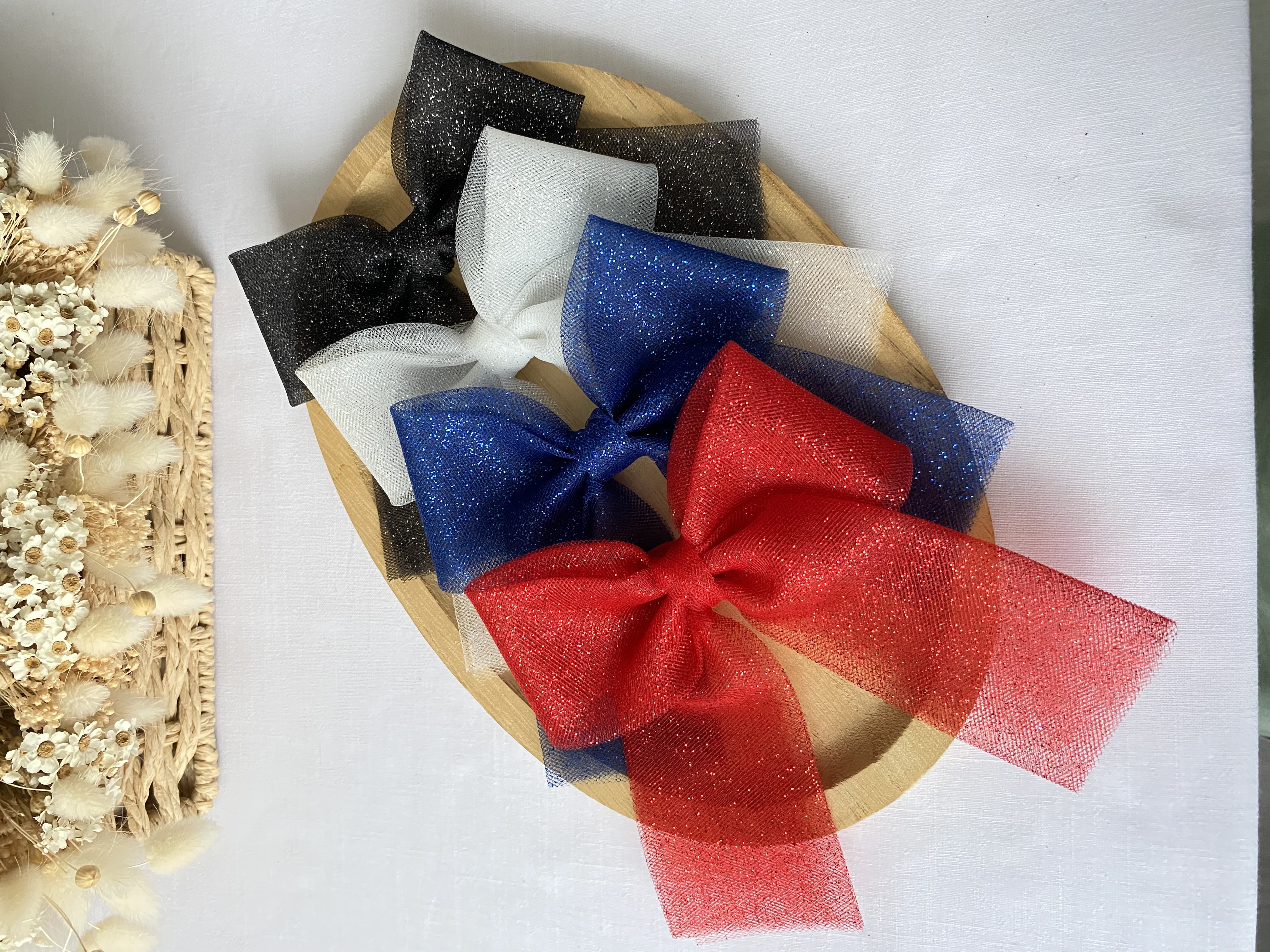 Noeud en tulle pailleté mi-long