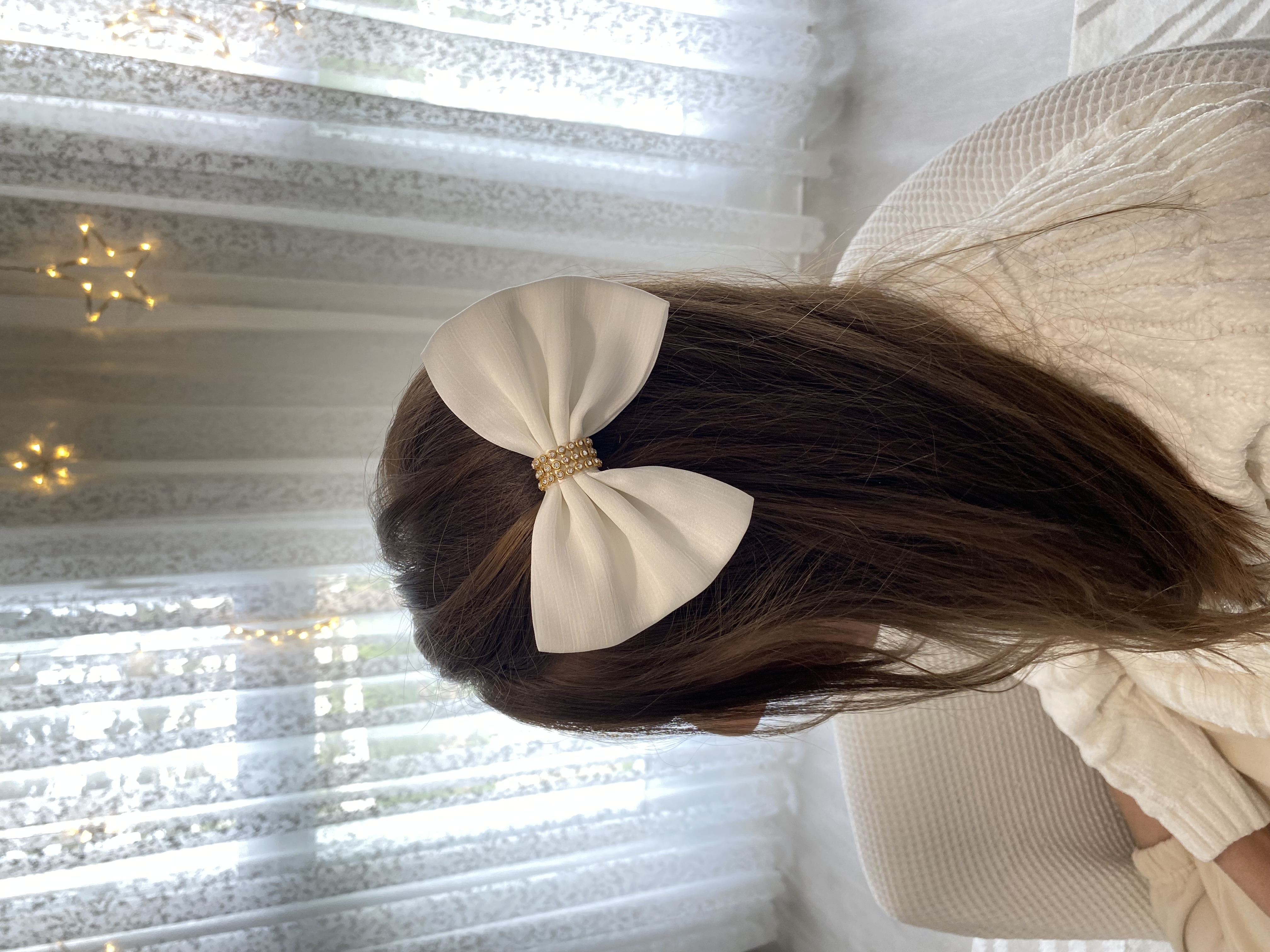 Noeud centre bijou strass