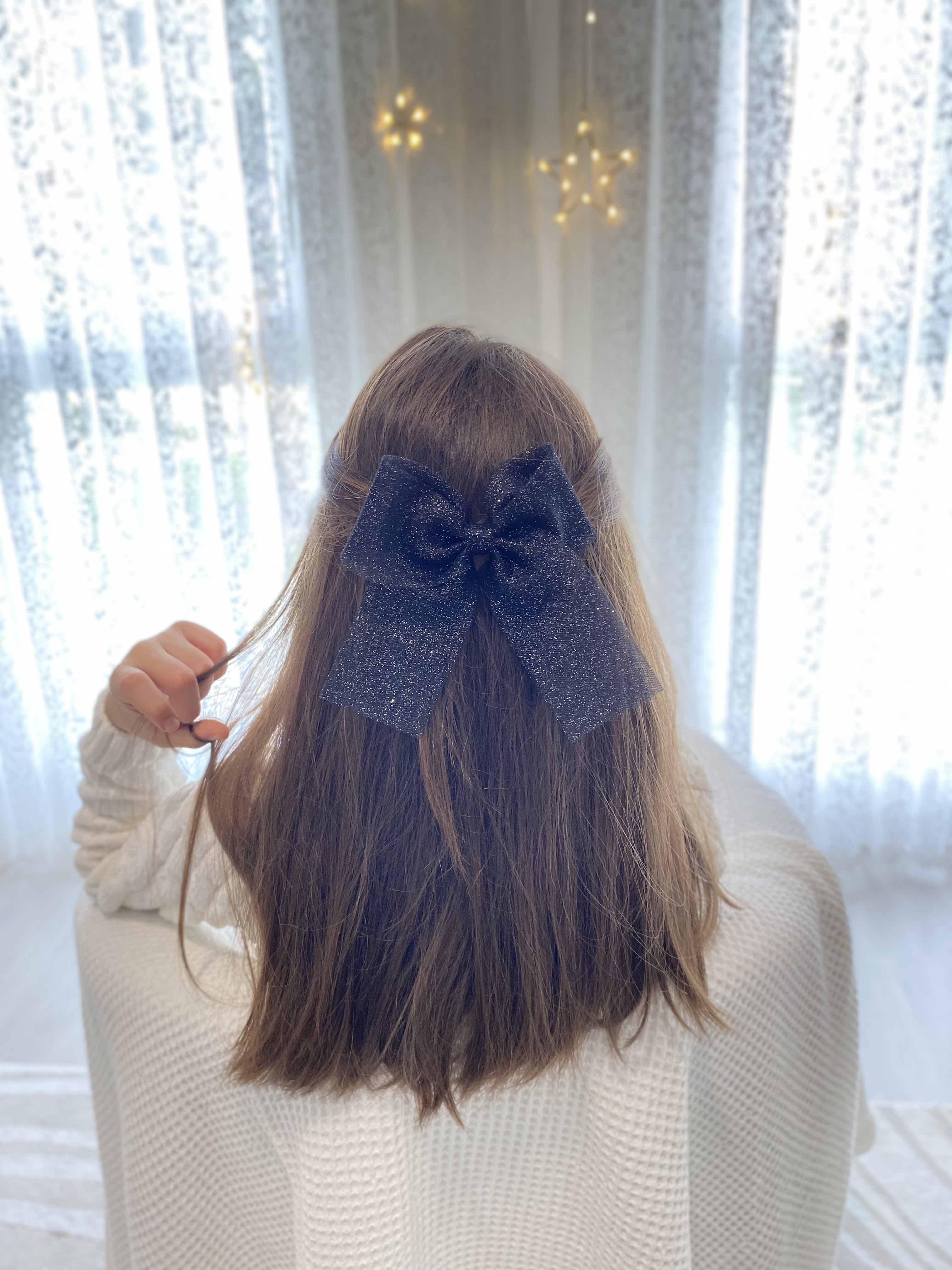 Noeud en tulle pailleté mi-long