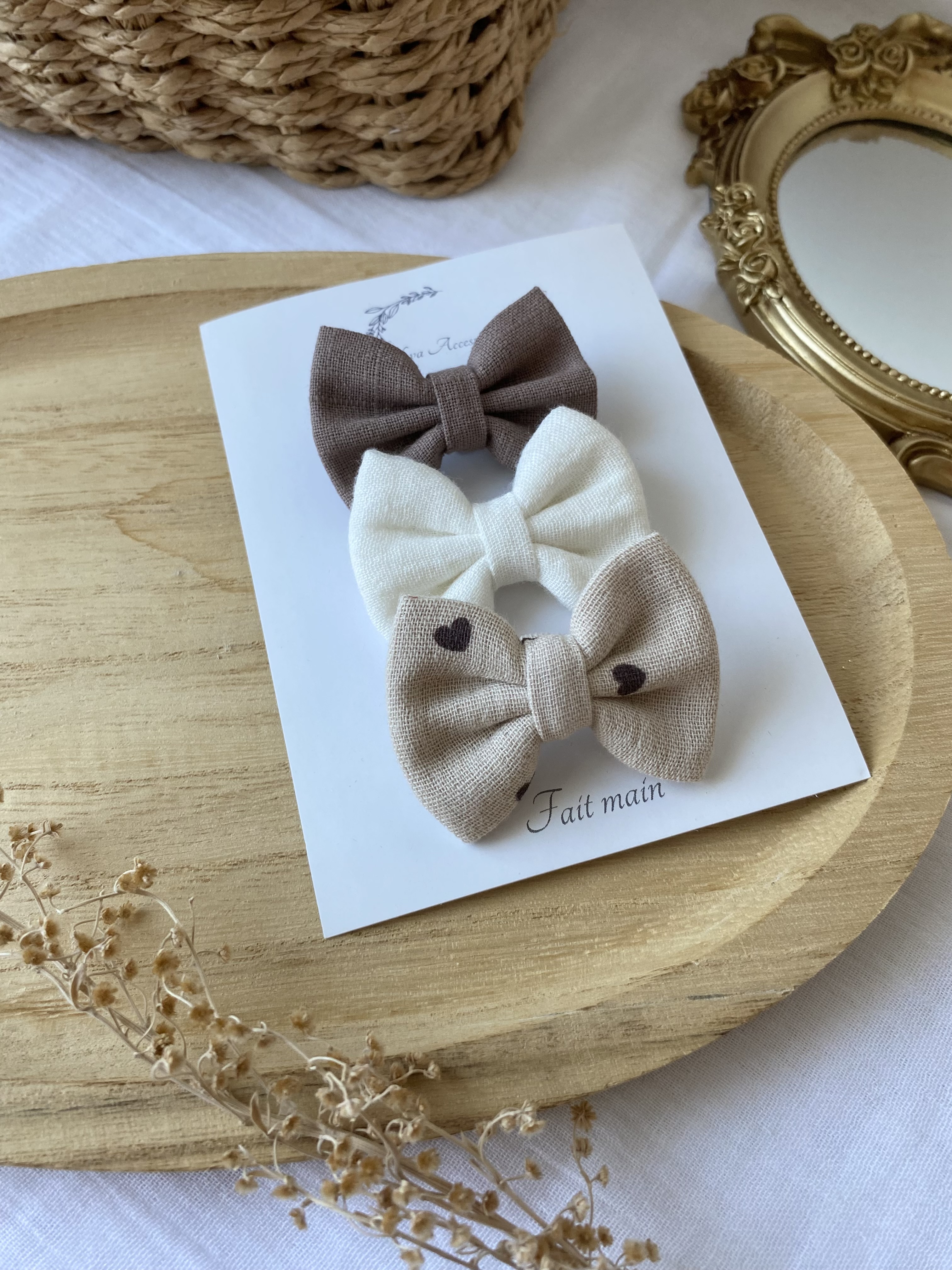 Lot de 3 nœuds petit coeur marron S