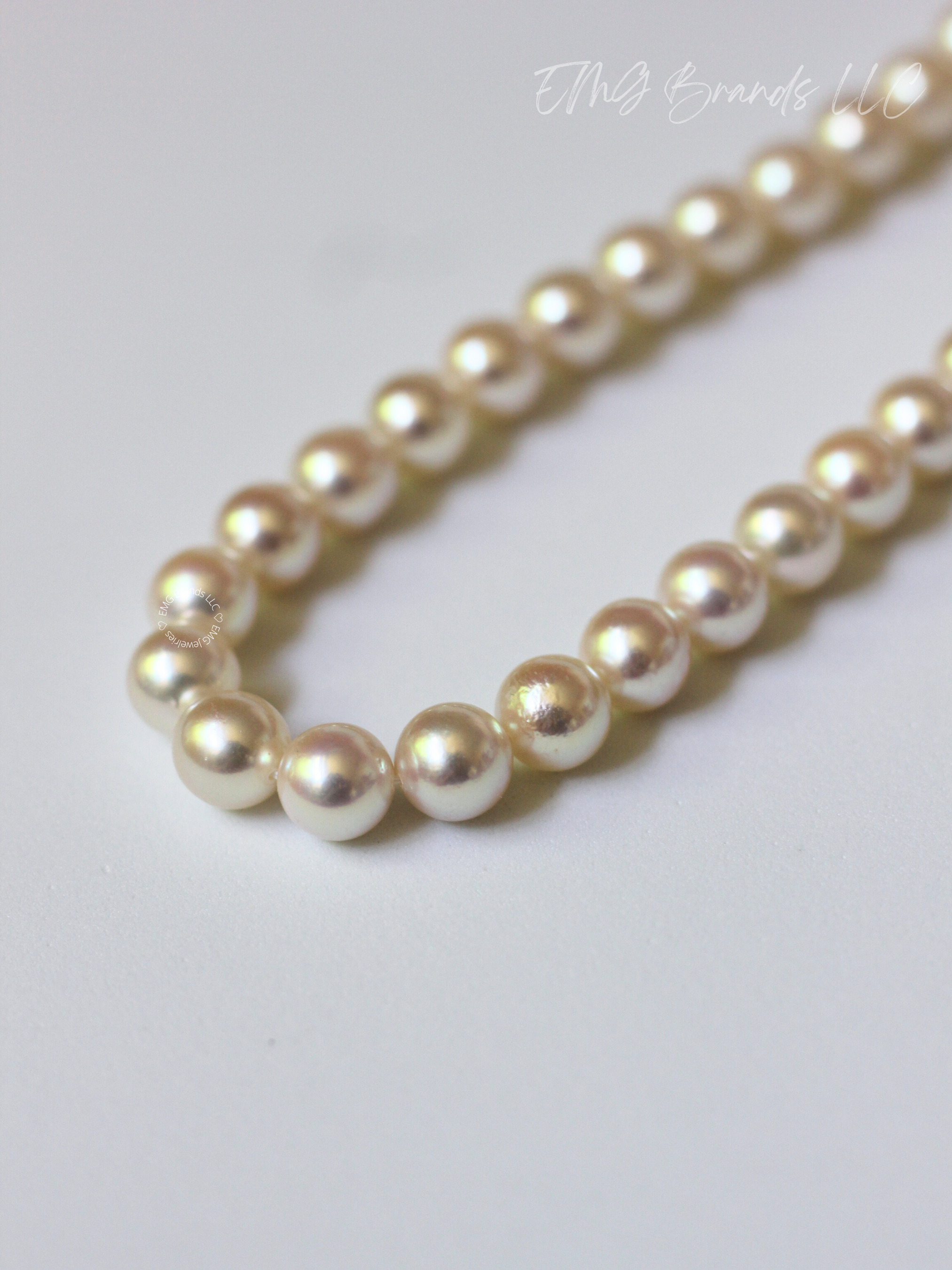 Classic Japanese Akoya Pearls with Rosy Pink Overtone