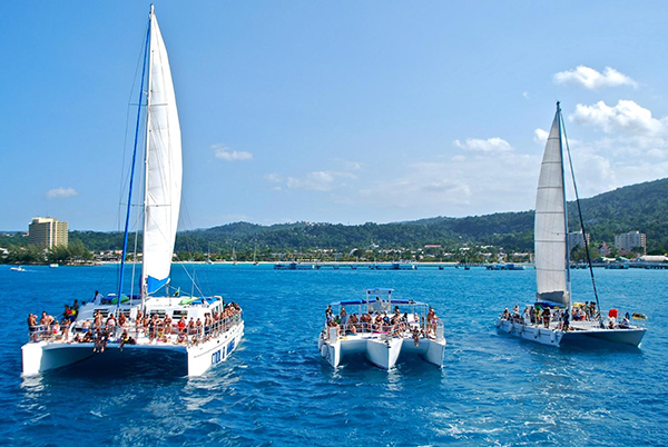 Negril Catamaran Party & Rick’s Cafe Sunset Tour from Montego Bay