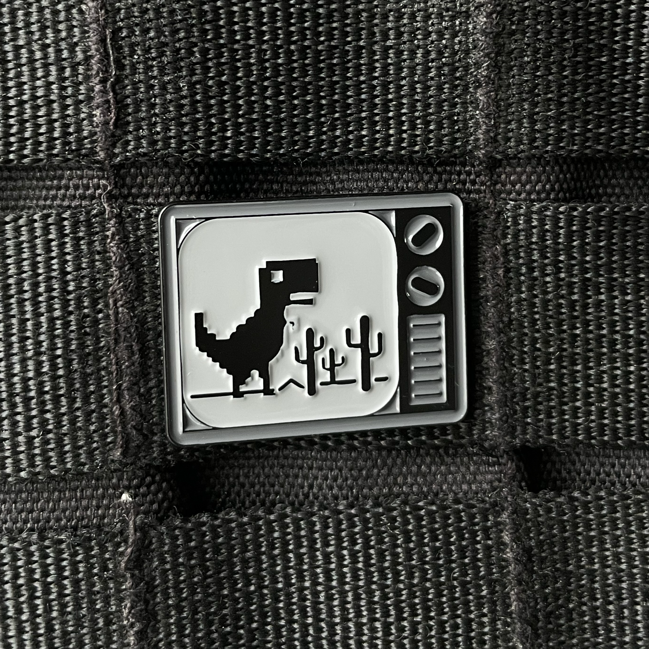 Metalinis pin ženklelis "T-rex"