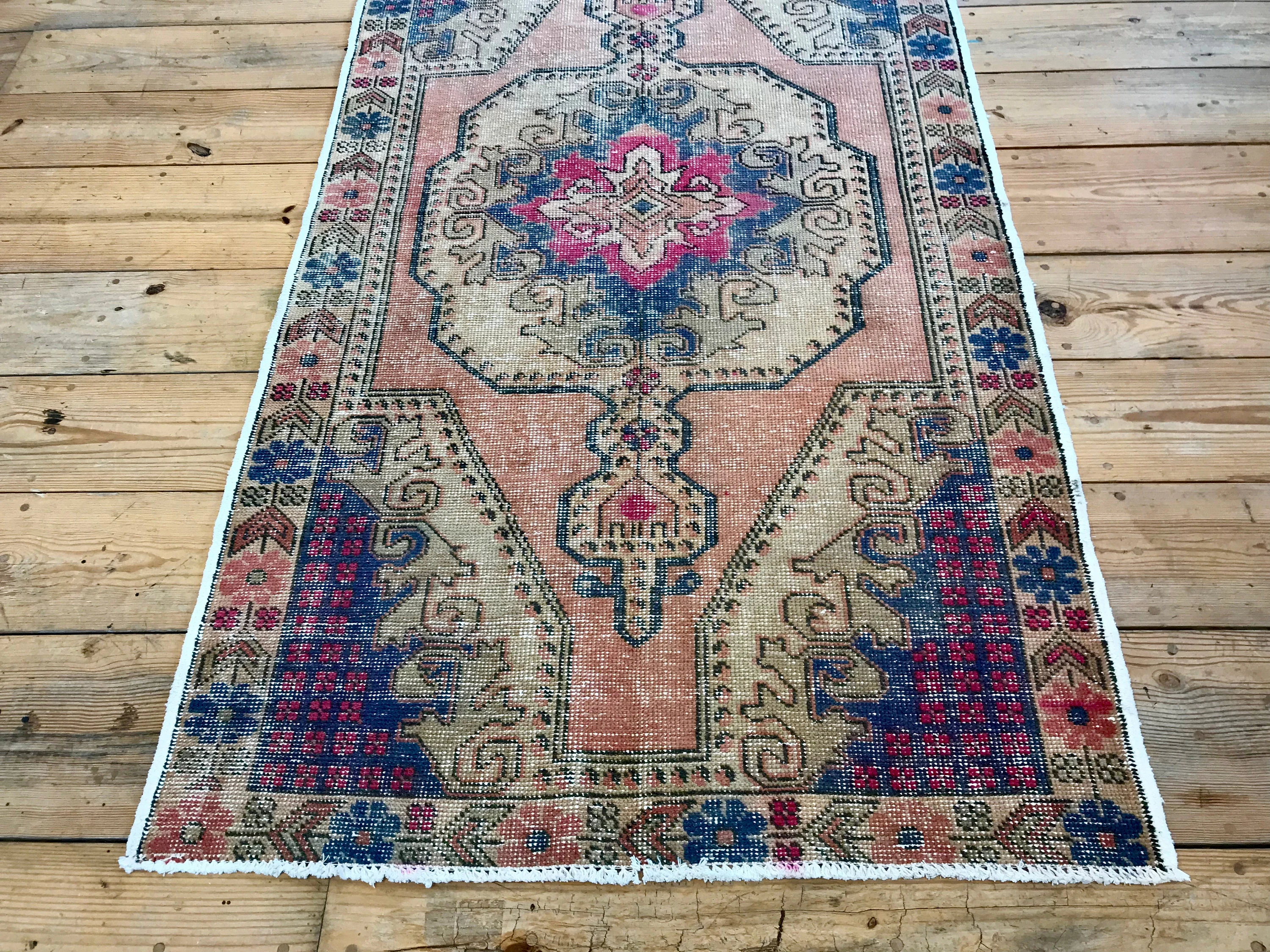 Vintage Hand Knotted Cream, Blue, and Pink Moroccan Wool Area Rug
