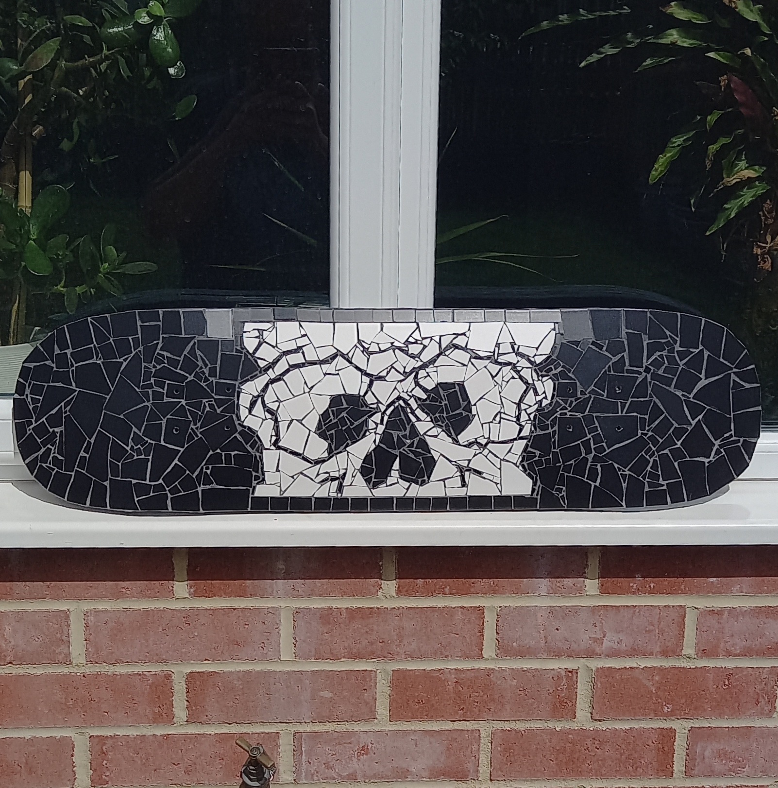 Peek-a-boo mosaic skateboard