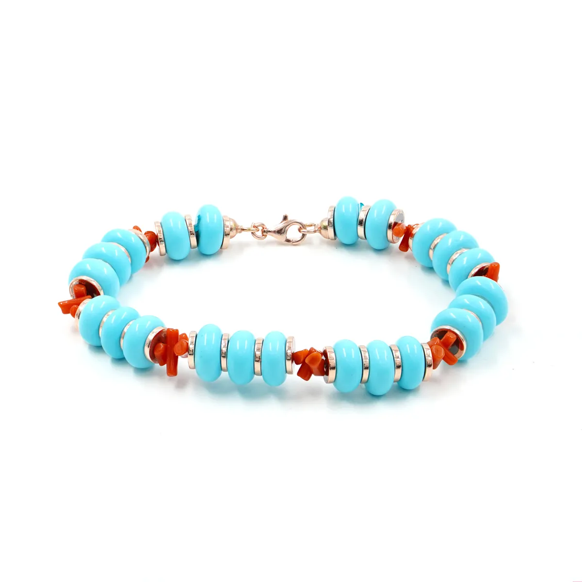 Bracciale in argento con rondelle in pasta di turchese, corallo ed ematite