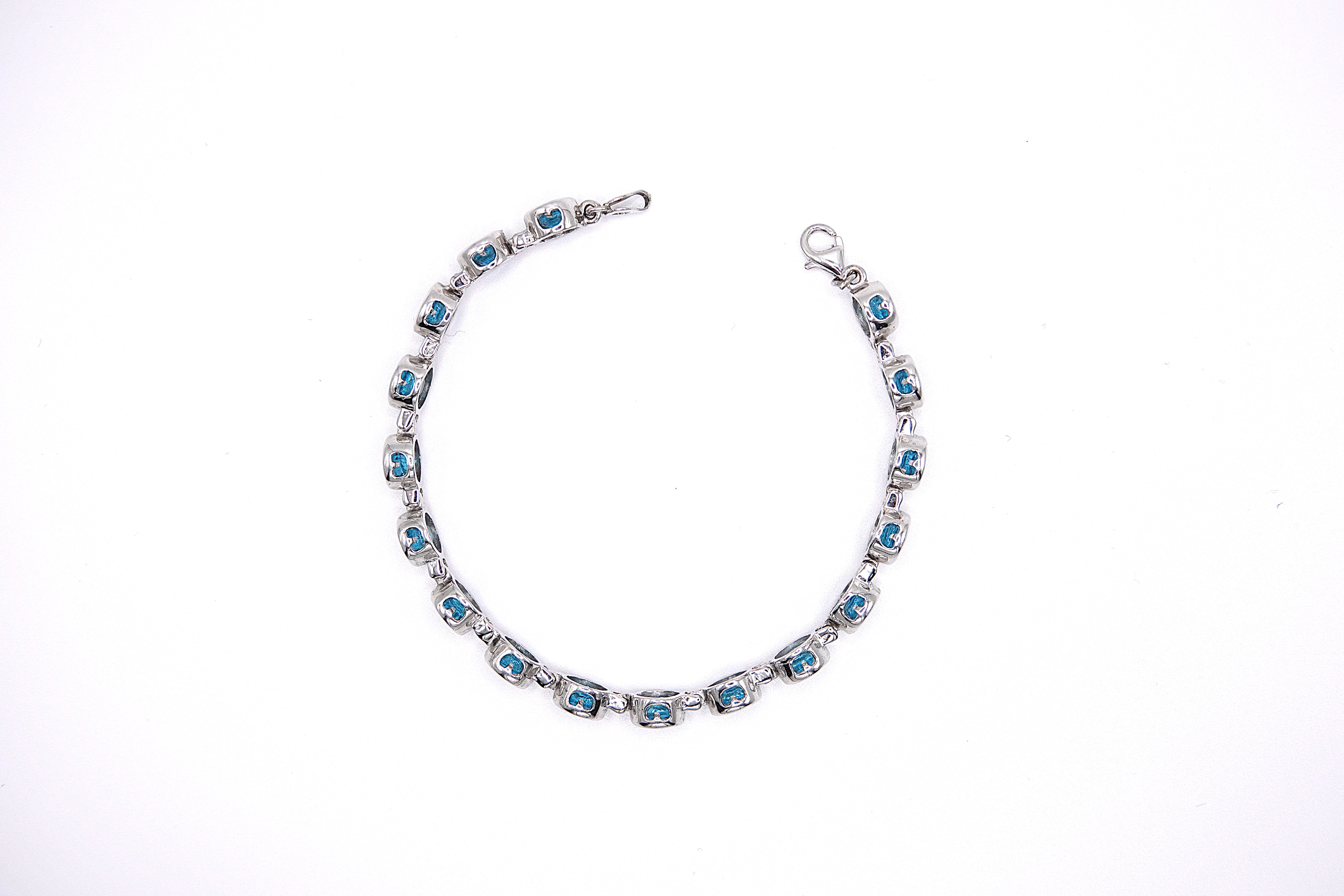 bracciale tennis con zirconi azzurri in argento 925 rodiato