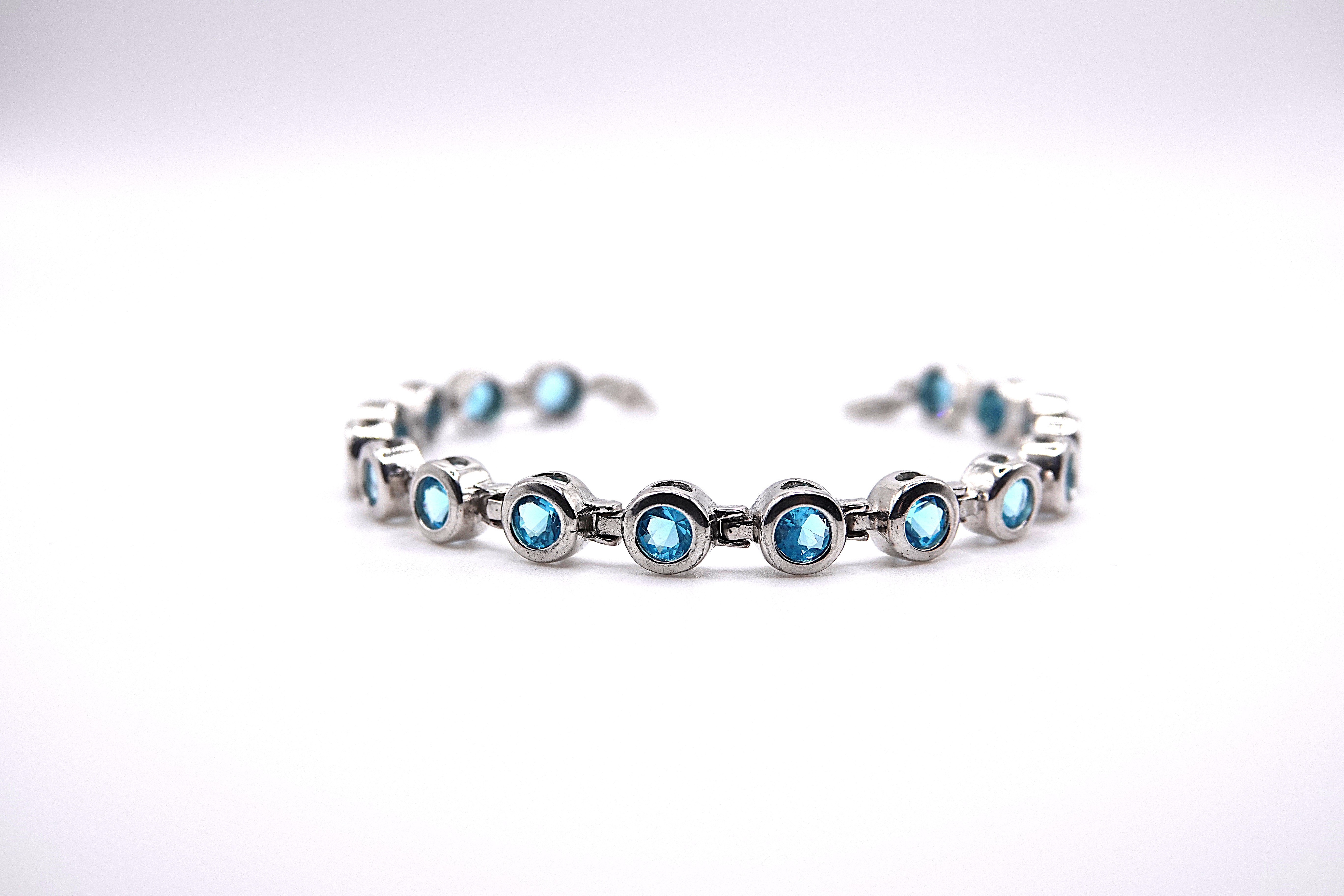 bracciale tennis con zirconi azzurri in argento 925 rodiato 