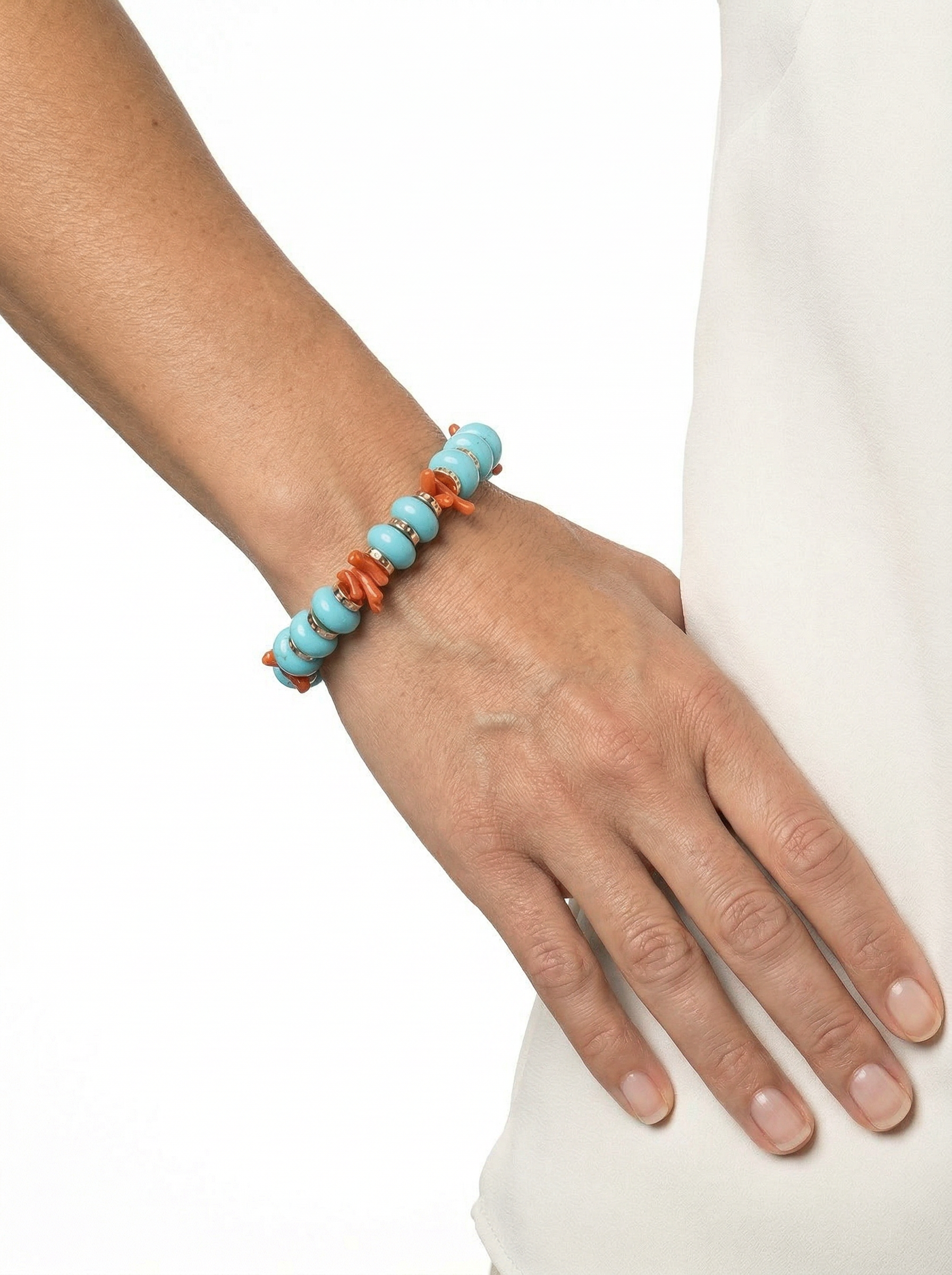 Bracciale in argento con rondelle in pasta di turchese, corallo ed ematite