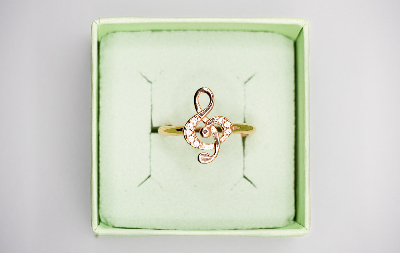 anello chiave di violino in argento 925 con zirconi  ramato