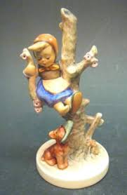 Porcelain Figurine of Child in Tree
