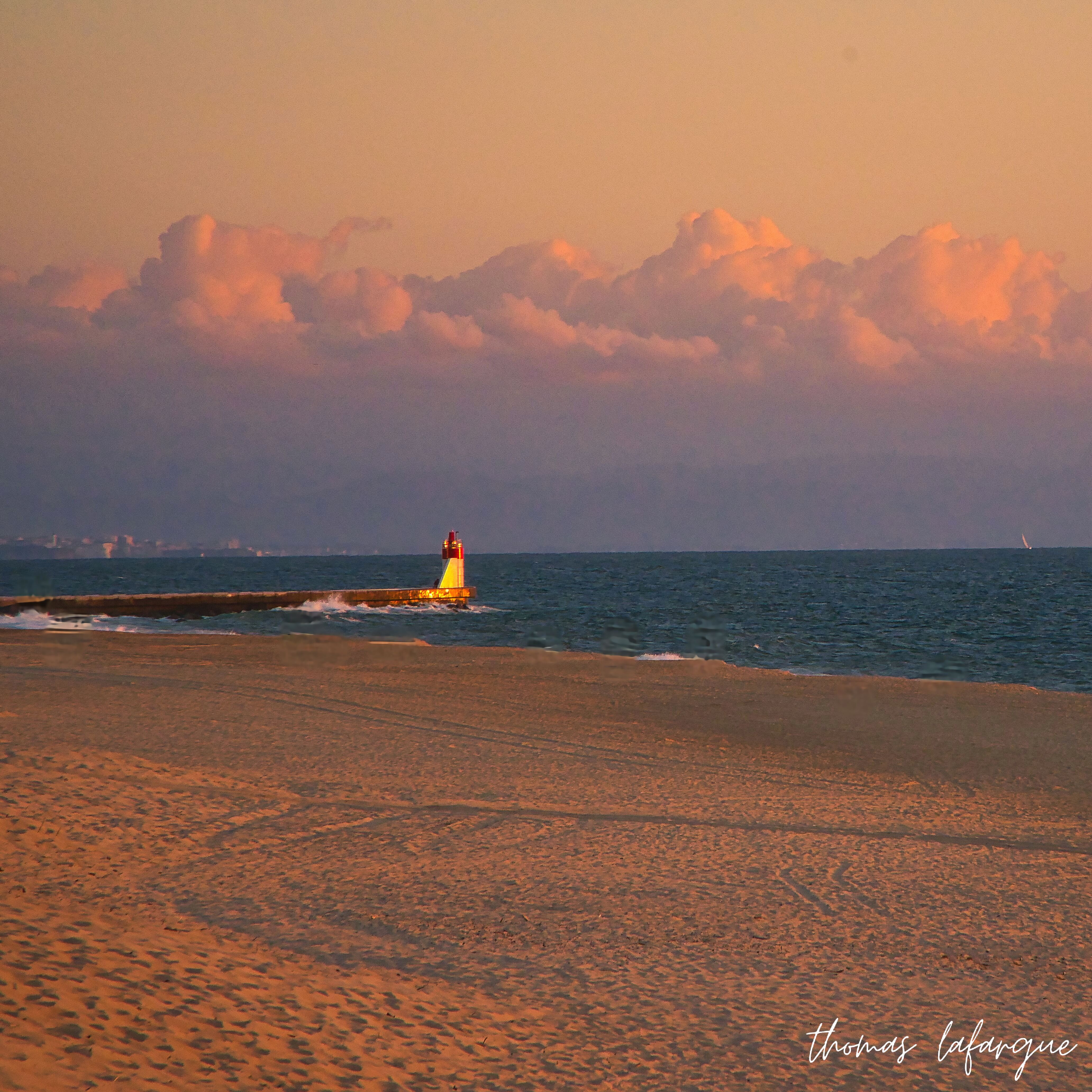 Photographie de Phare au Coucher du Soleil