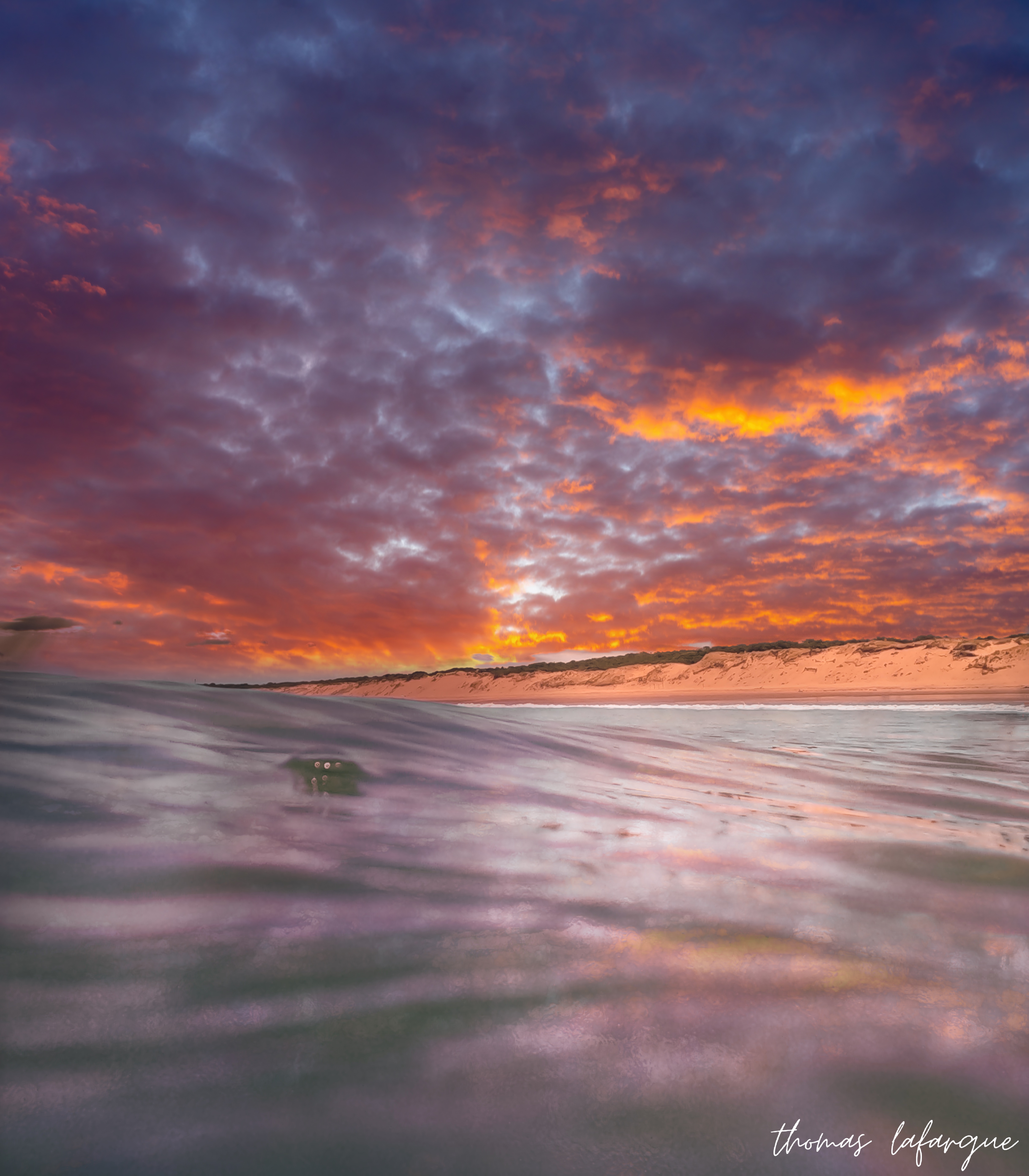Photographie de coucher de soleil sur la plage