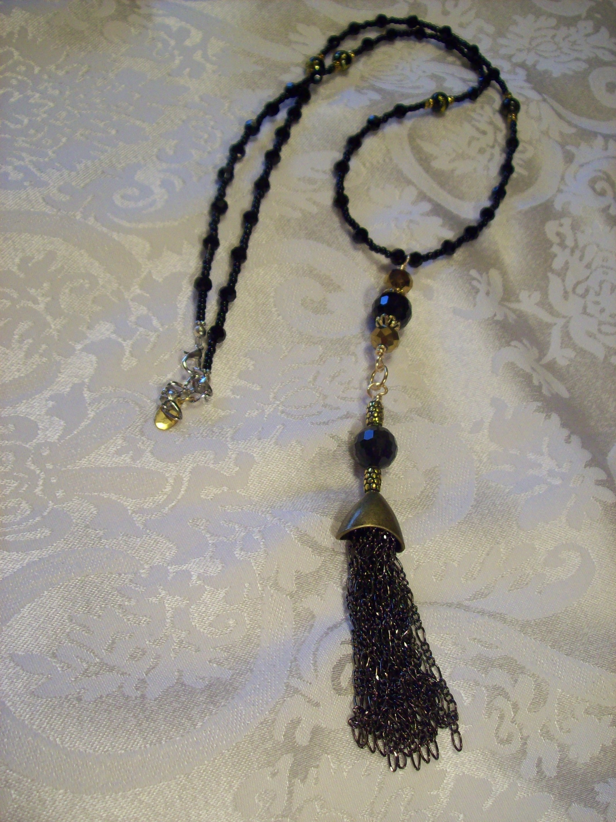 Faceted Black & Gold glass Tassel Necklace