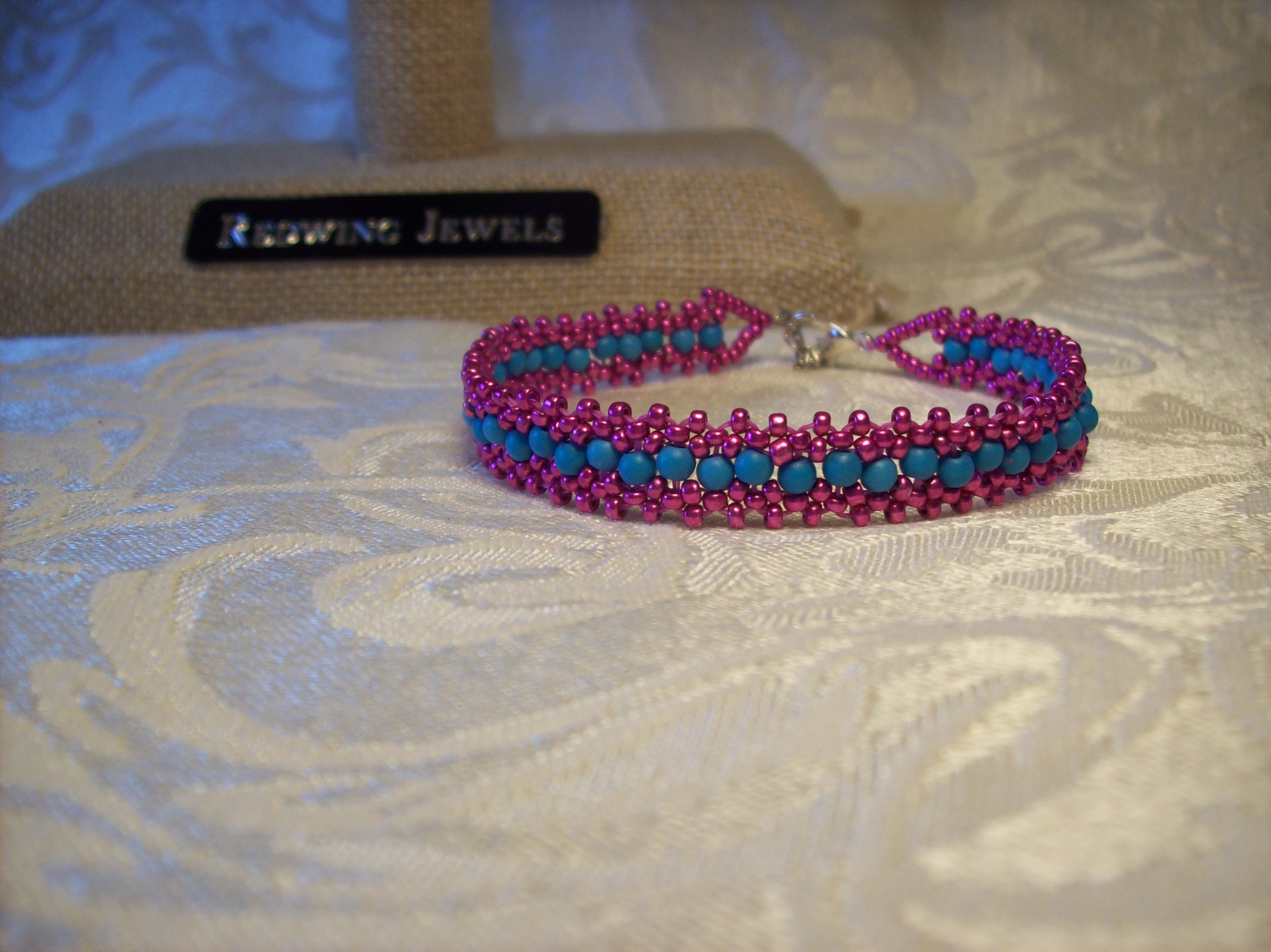 Hot Pink & 3mm Round Blue glass Lace Bracelet with a Silver Plated clasp