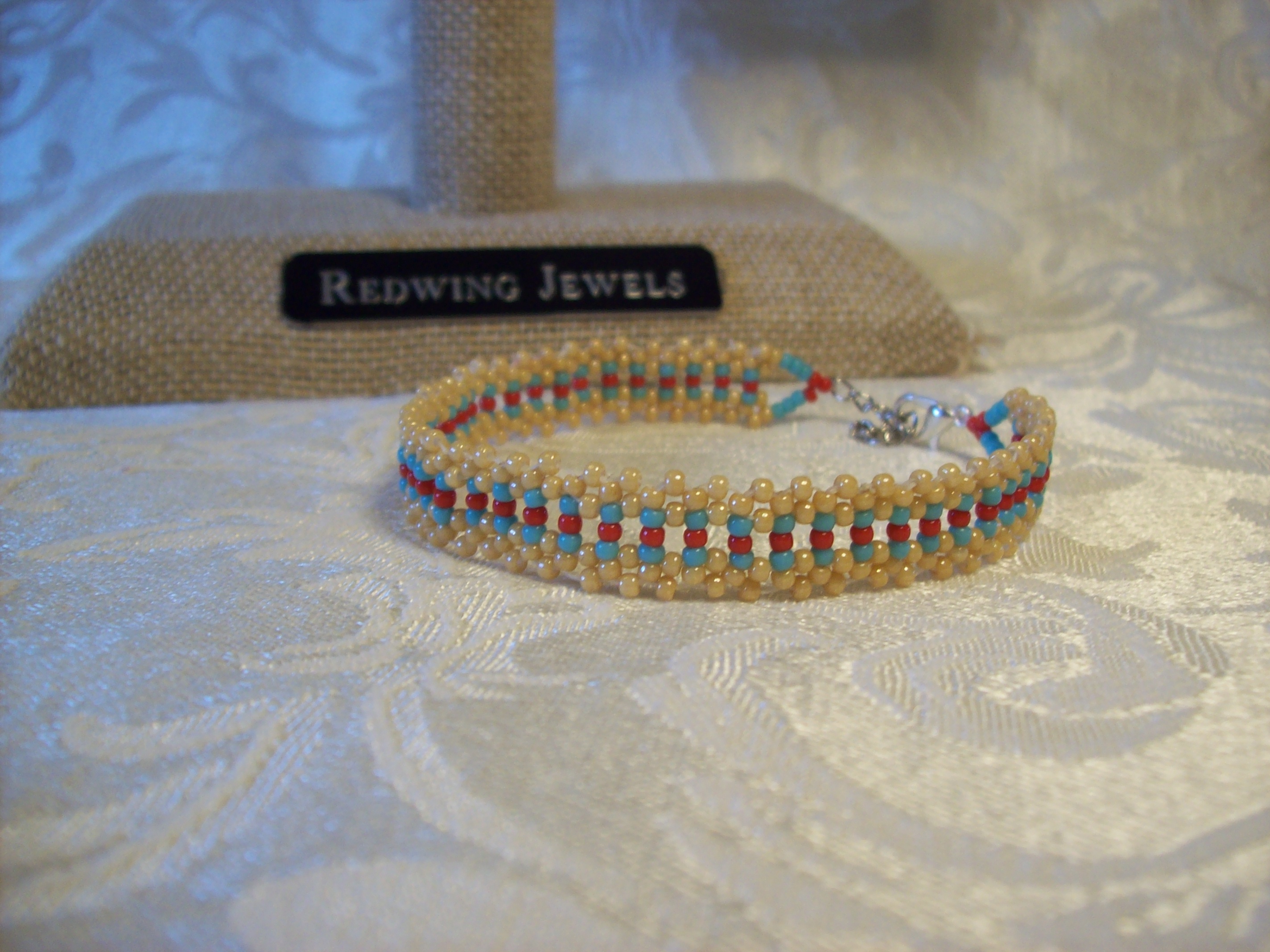 Tan, Blue, Red  Lace Bracelet with a Silver plated clasp