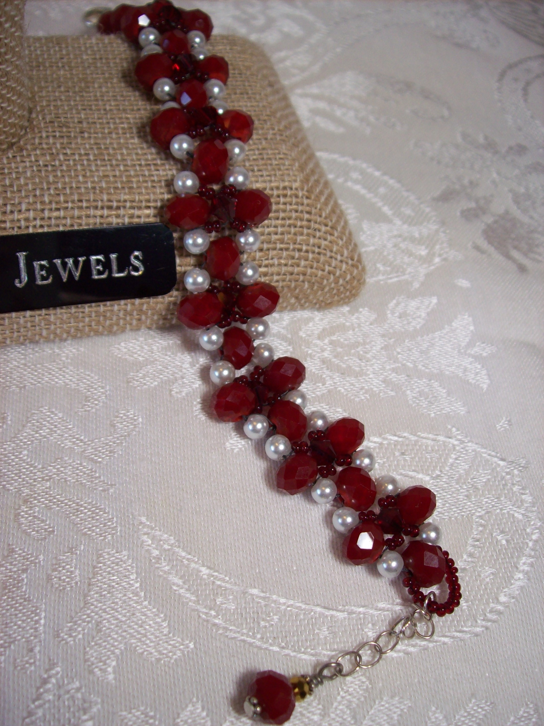 White Cultured Pearls and Faceted red glass Bracelet with a Sterling Silver clasp and chain