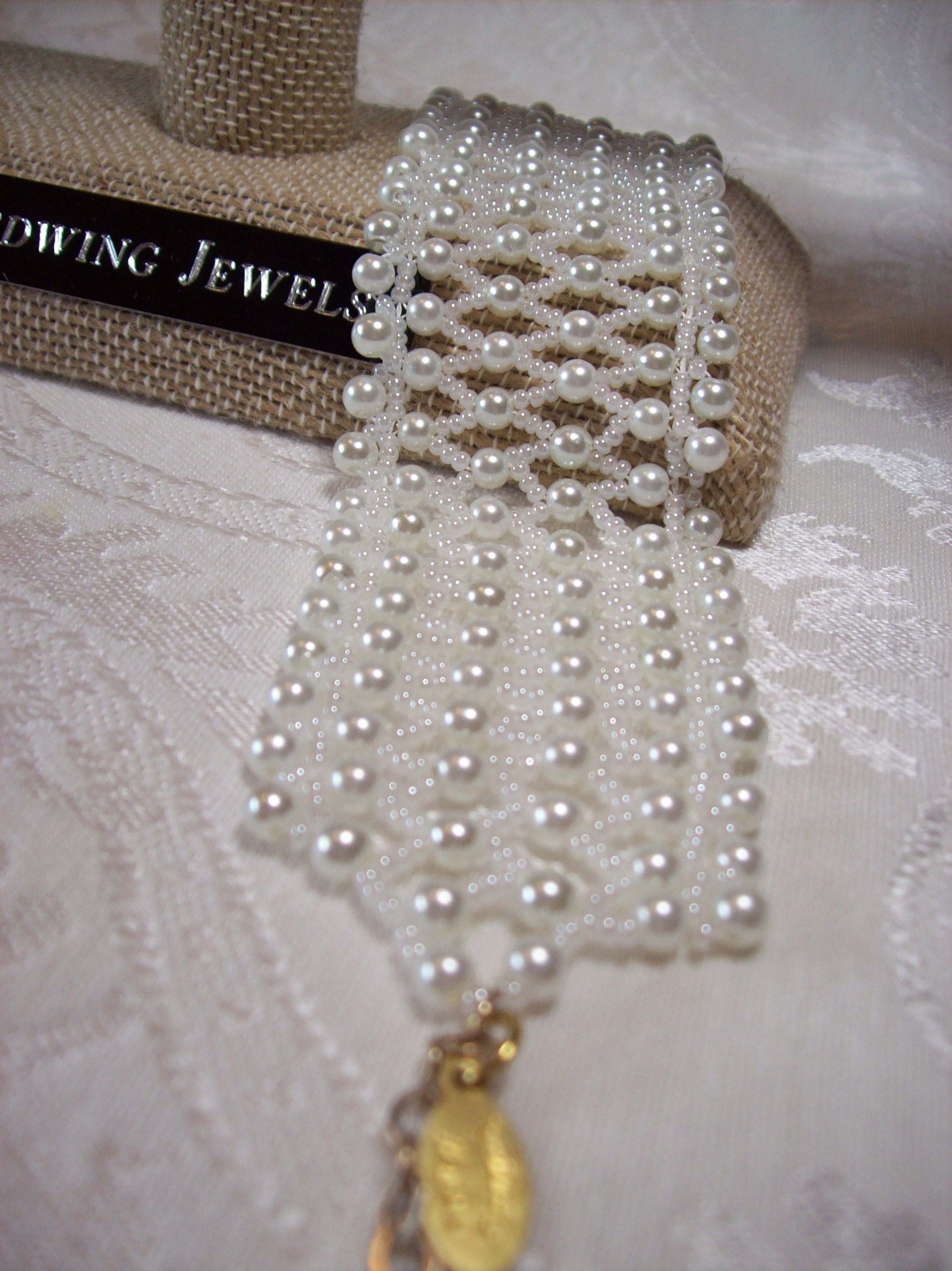 White glass Pearl Cuff Bracelet with a Sterling Silver clasp and chain