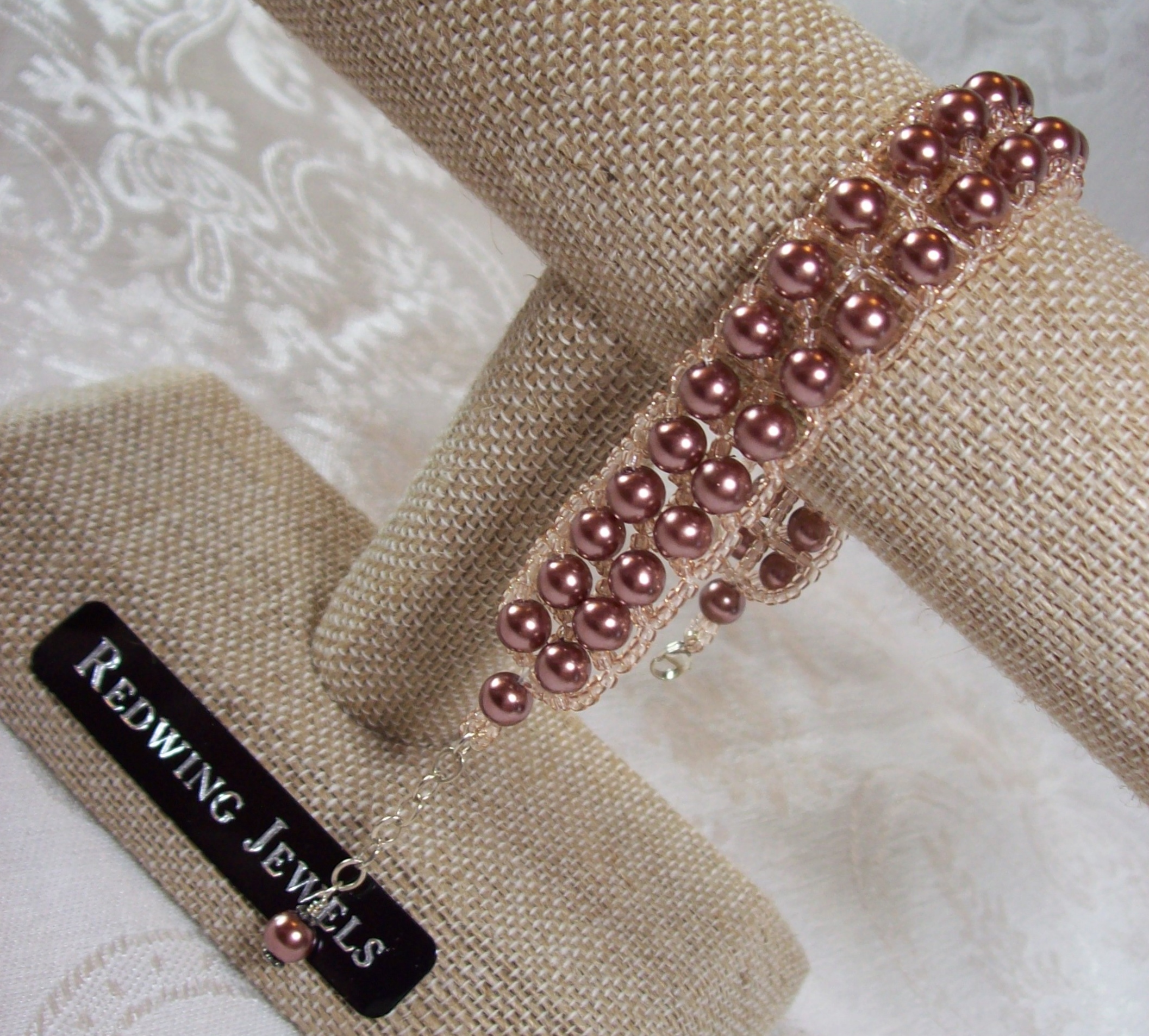 Bronze Glass Pearl Bracelet with a Sterling Silver clasp and chain 