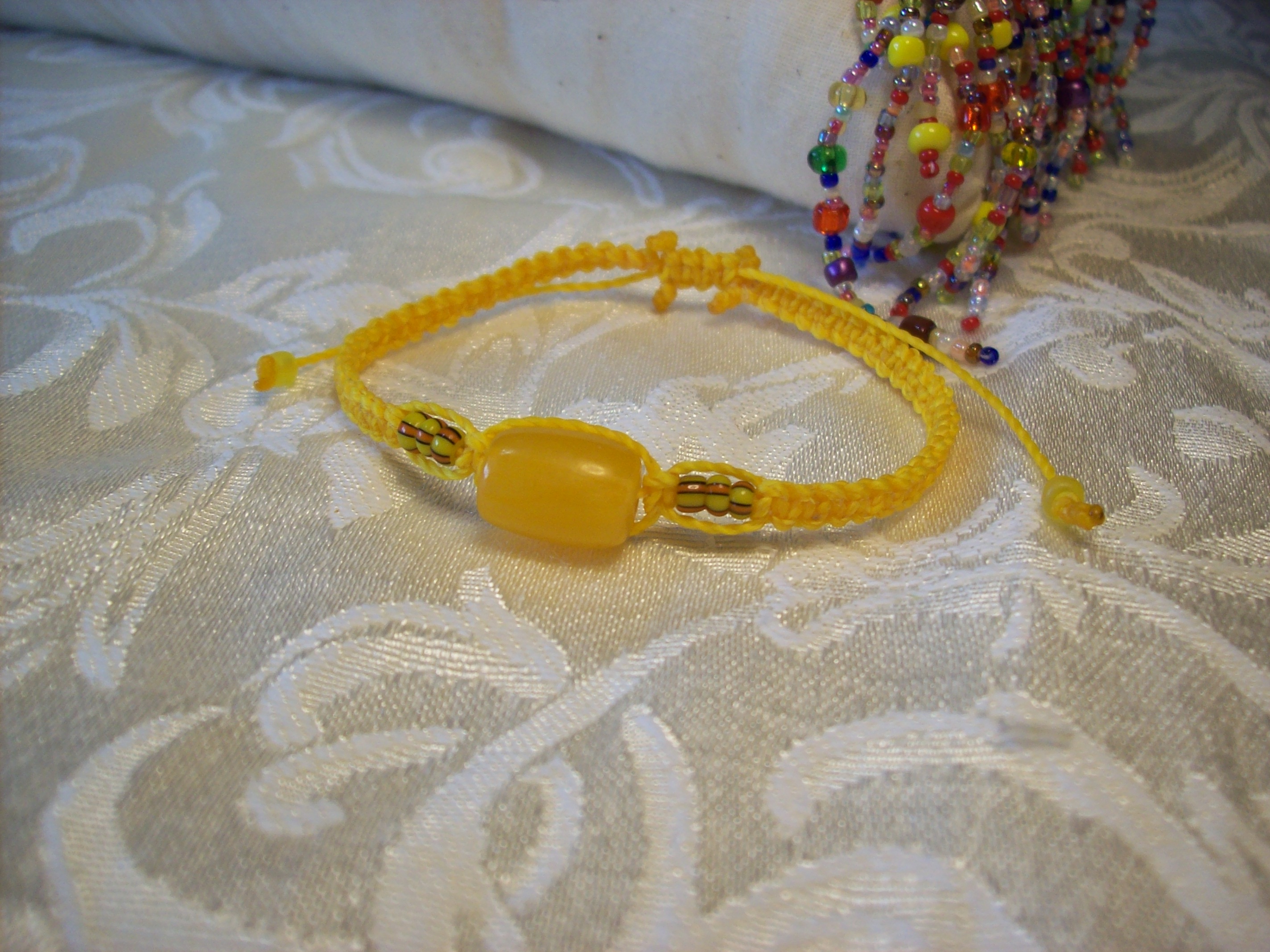 Yellow cylinder bead Macramé Bracelet