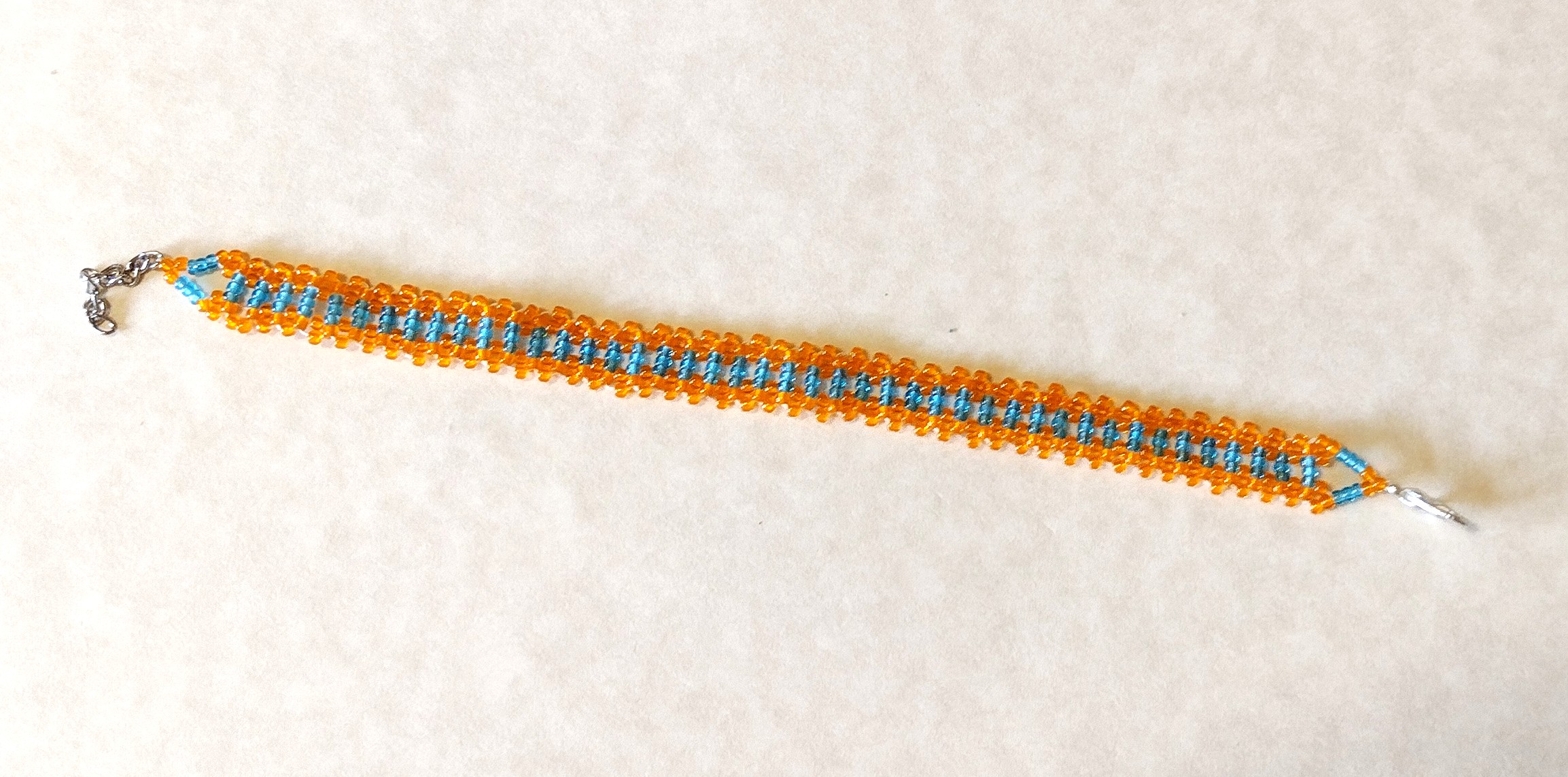 Clear Orange and Blue Lace Bracelet