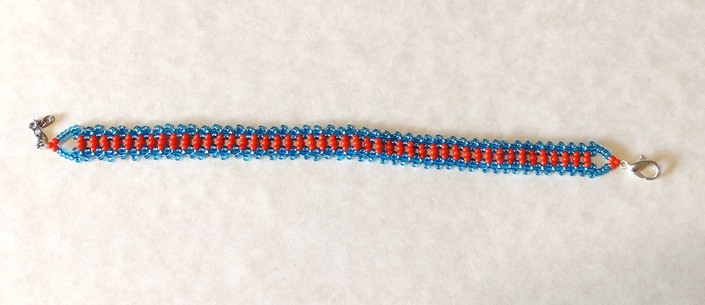 Clear Blue and Orange Lace Bracelet