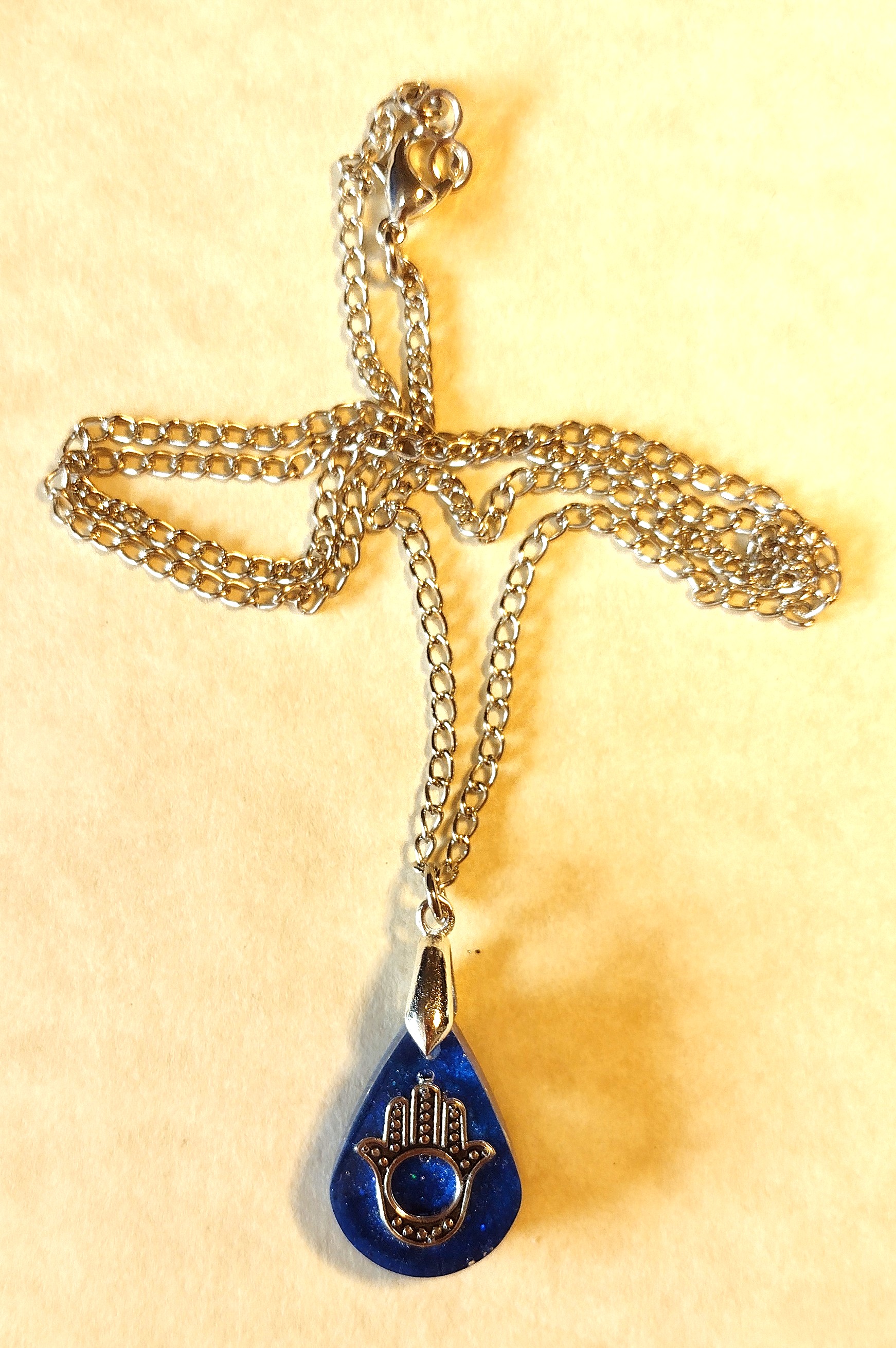 Dk. Blue Hamsa Teardrop Resin Necklace