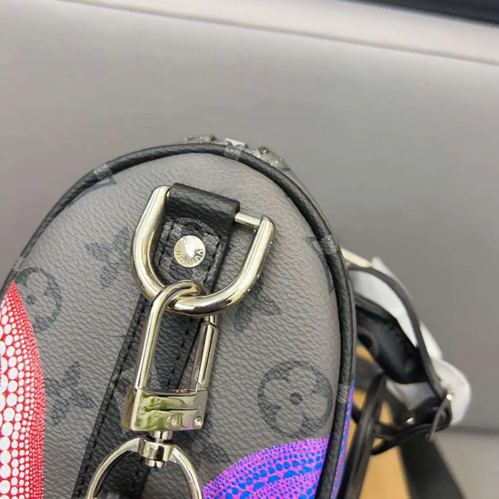 Sac à main noir avec motifs citrouilles style LVi