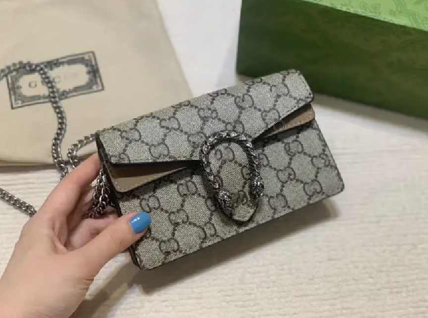 Sac à main marron à motifs style Guccie