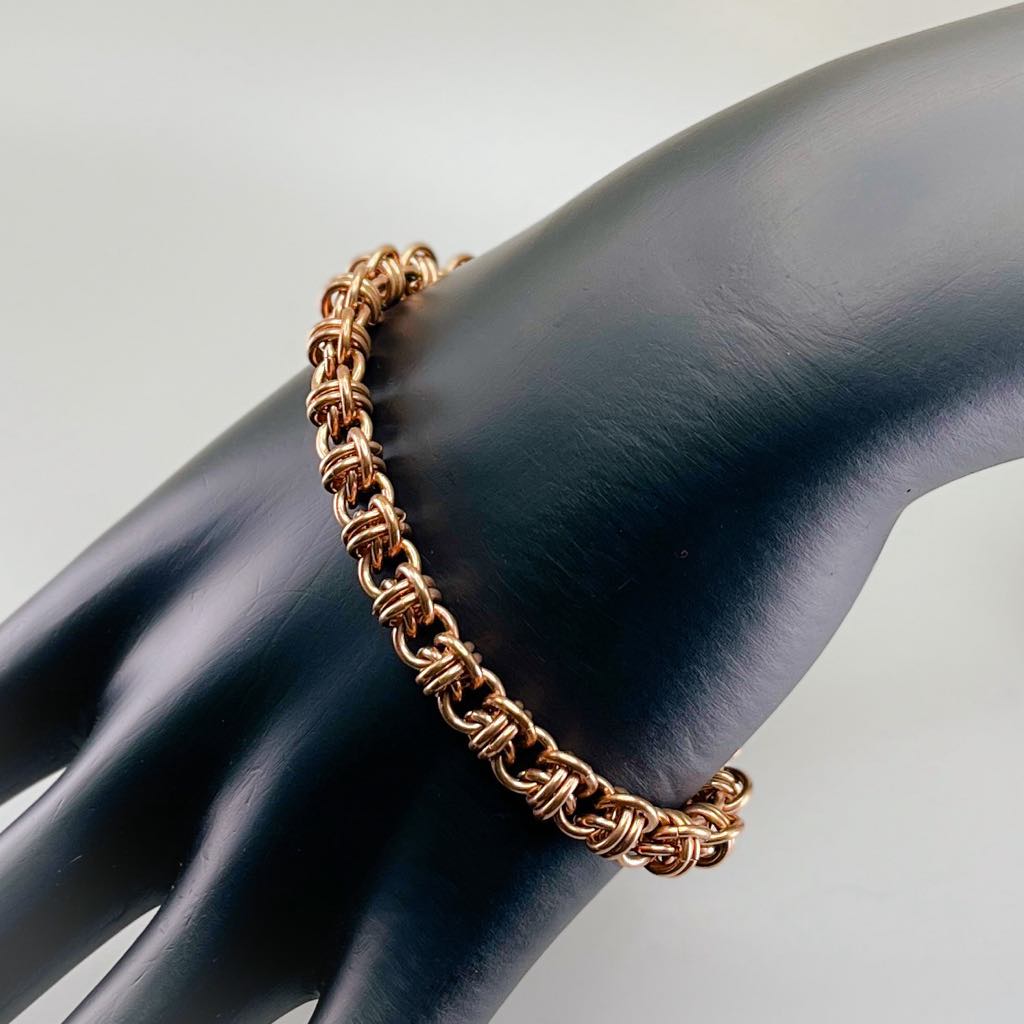 Sunbound Bronze Woven Bracelet with Rose Gold Clasp