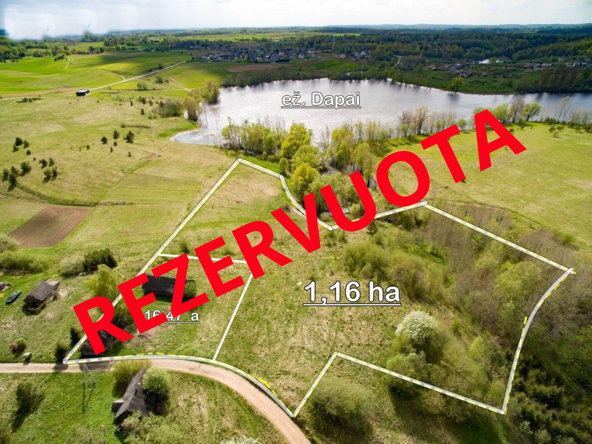 Trakų raj., Raipolio k., prie Dapų ež. paduodamas 1,326 ha sklypas su pastatais