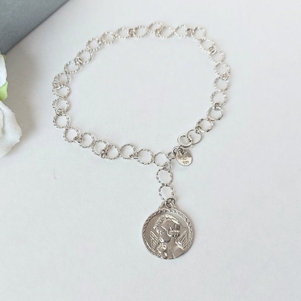 Pulsera de plata con dije angelito