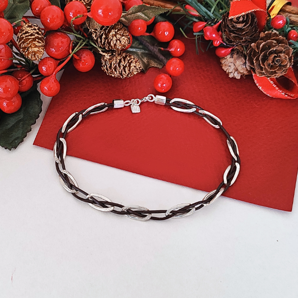 Brazalete en plata 925 entrelazado con cuero
