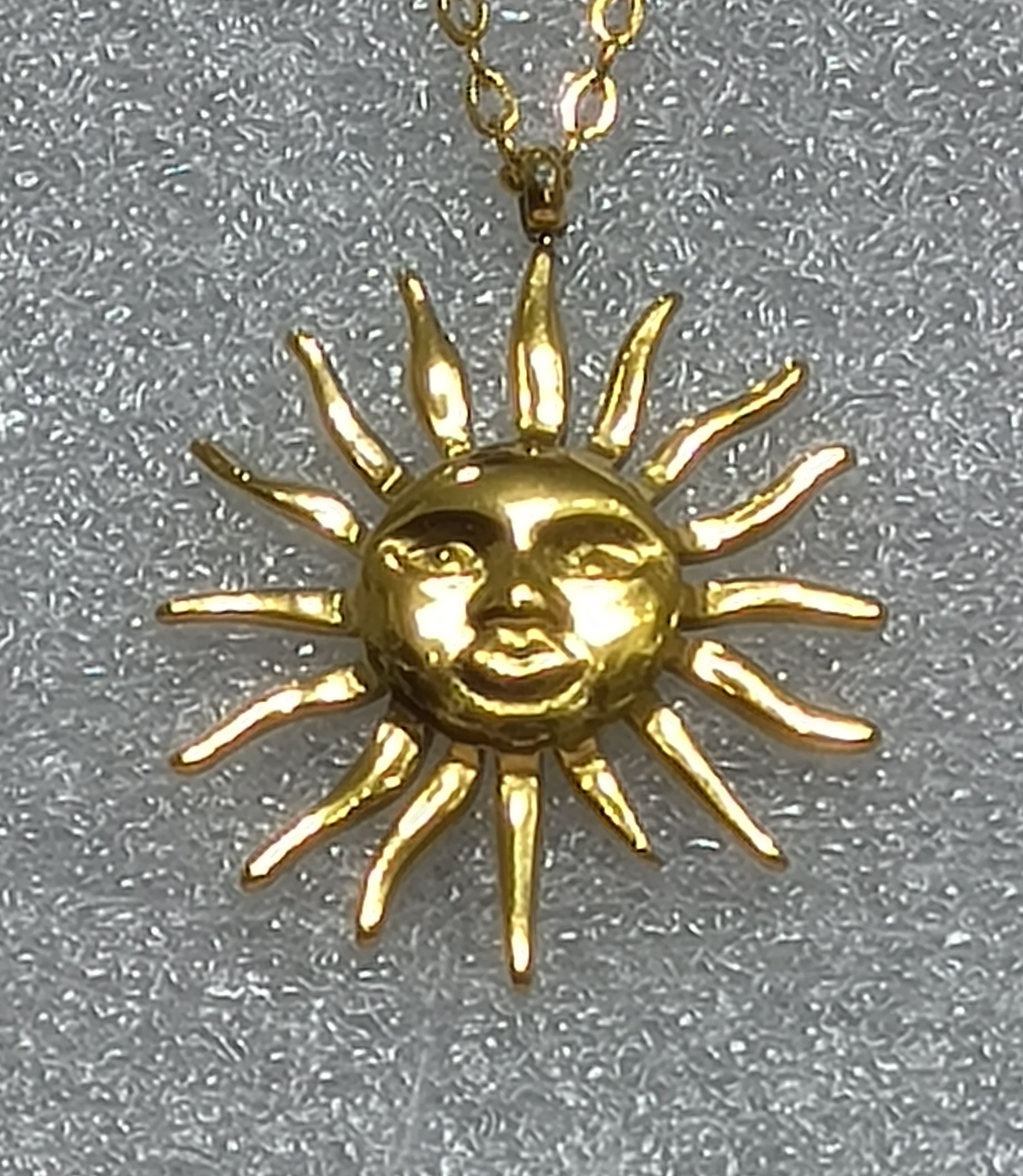 Colgante Sol Carita.