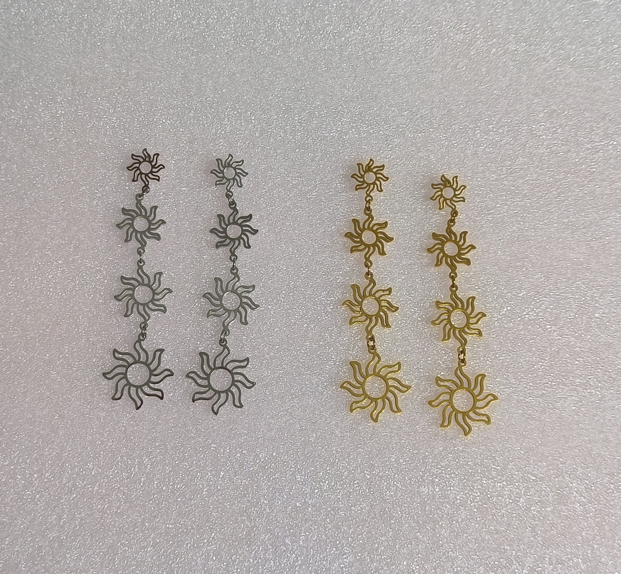 Pendientes Sol largos.