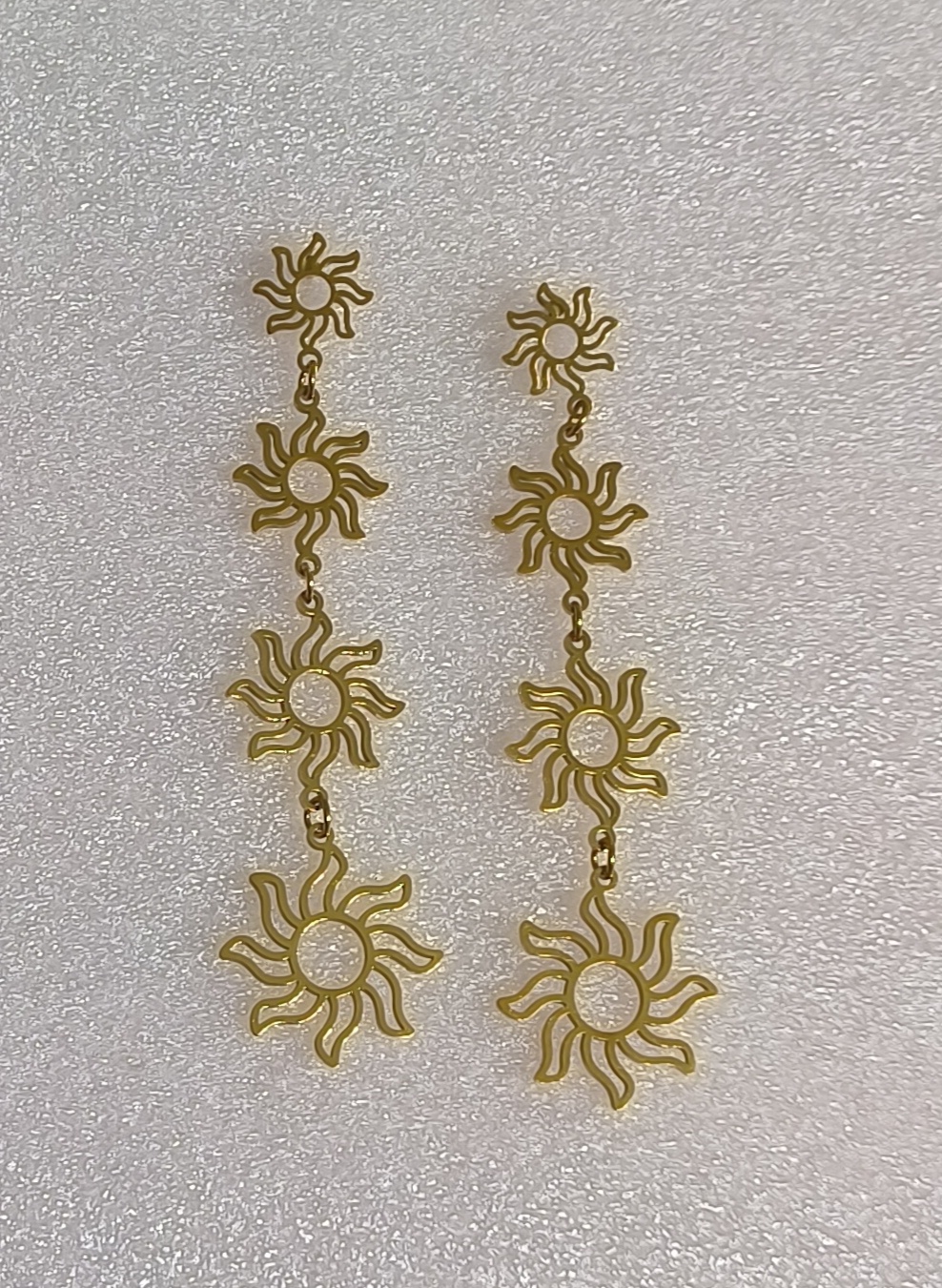 Pendientes Sol largos.