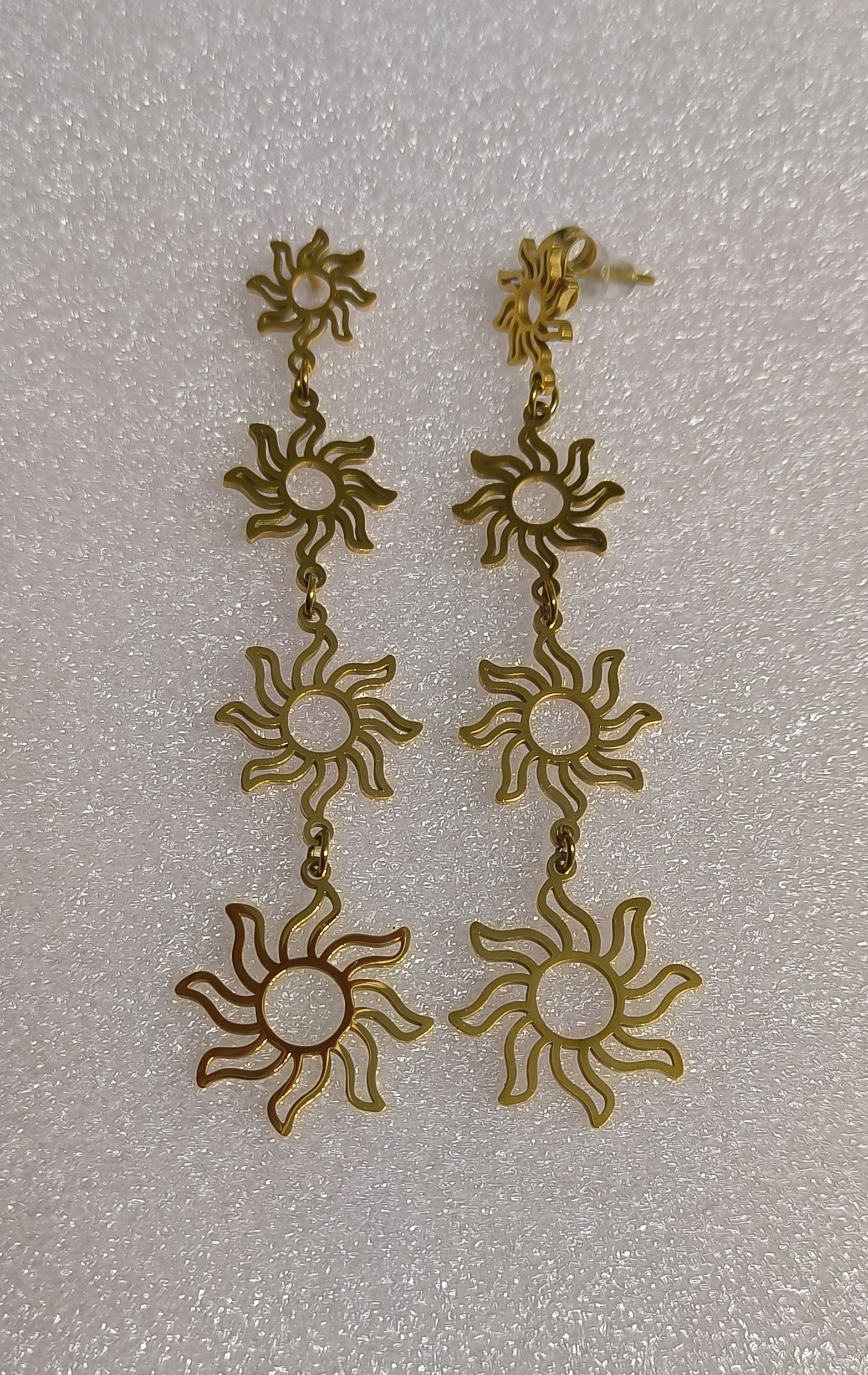 Pendientes Sol largos.