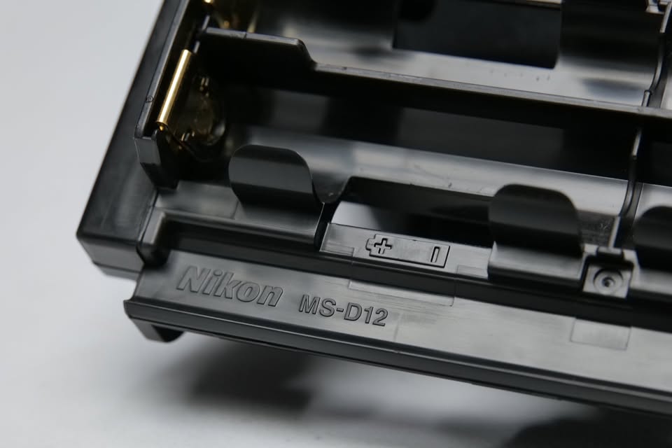Nikon MS-D12EN Battery Holder Tray for EN-EL15 MB-D12 MB-D17 MB-D18. (M6).