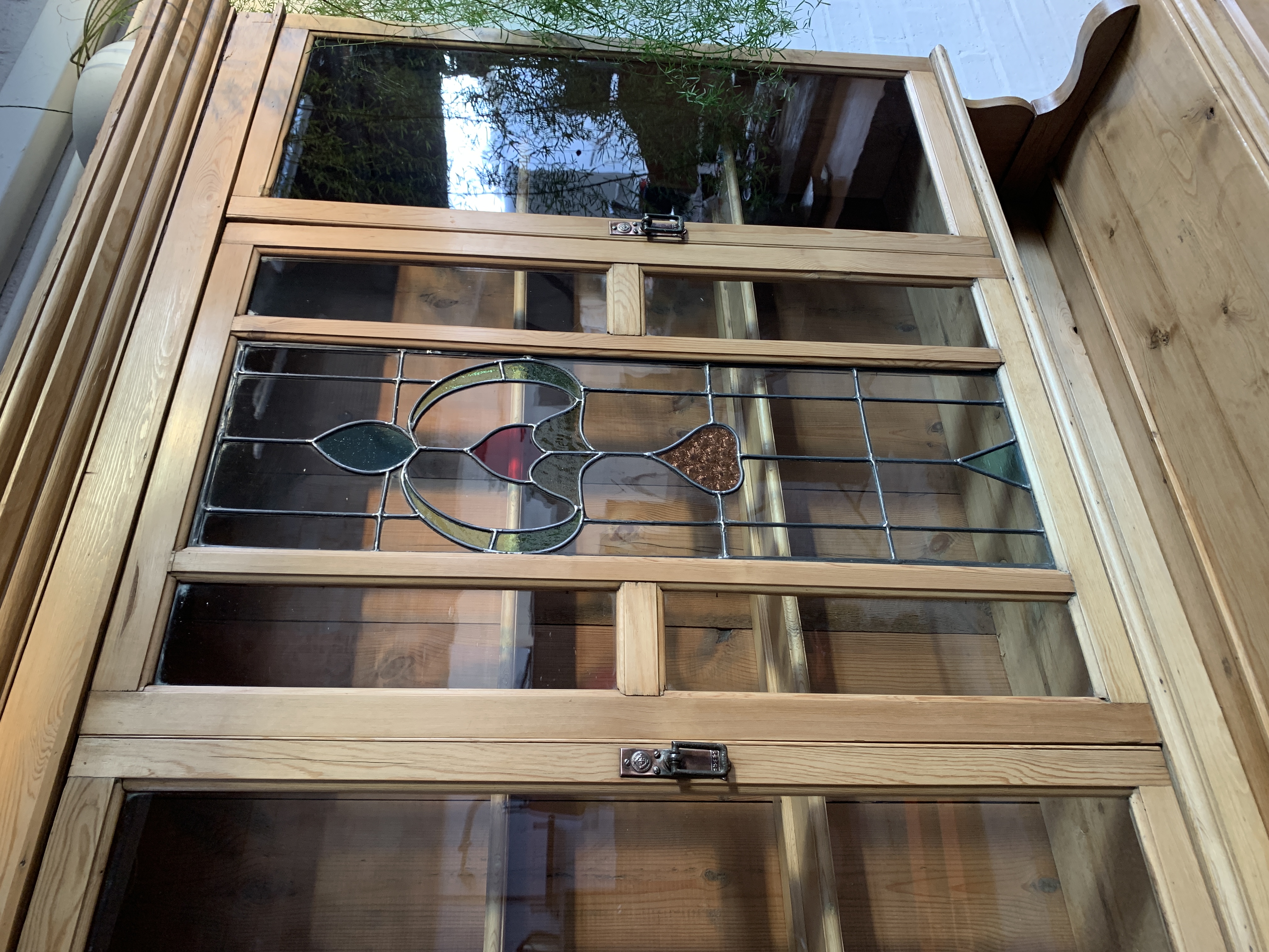 Early 20th Century Pine Farmhouse Kitchen Dresser / Housekeeping Cupboard with Leaded Stained Glass & Hand Carved Doors