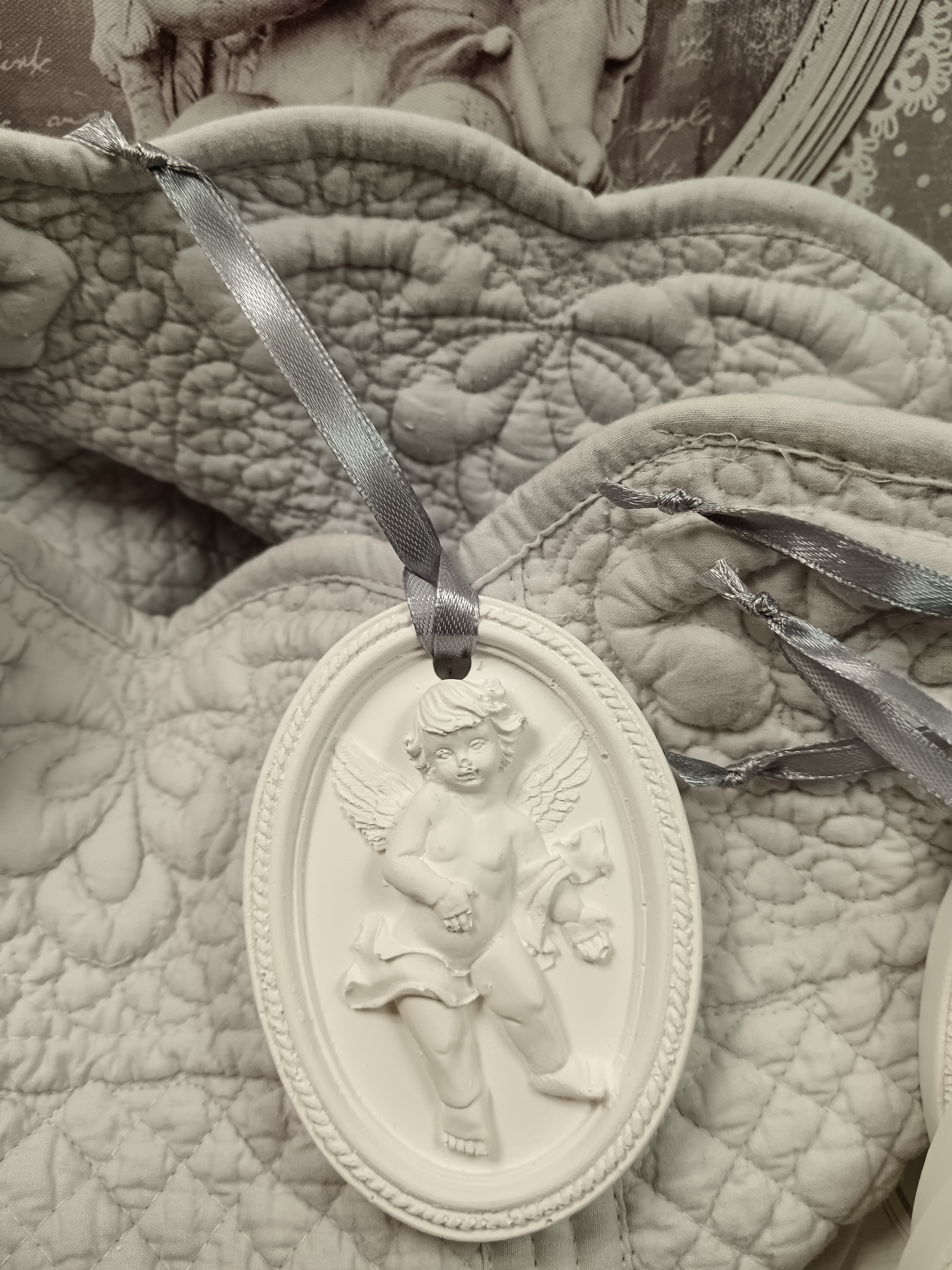 Médaillon ange a suspendre