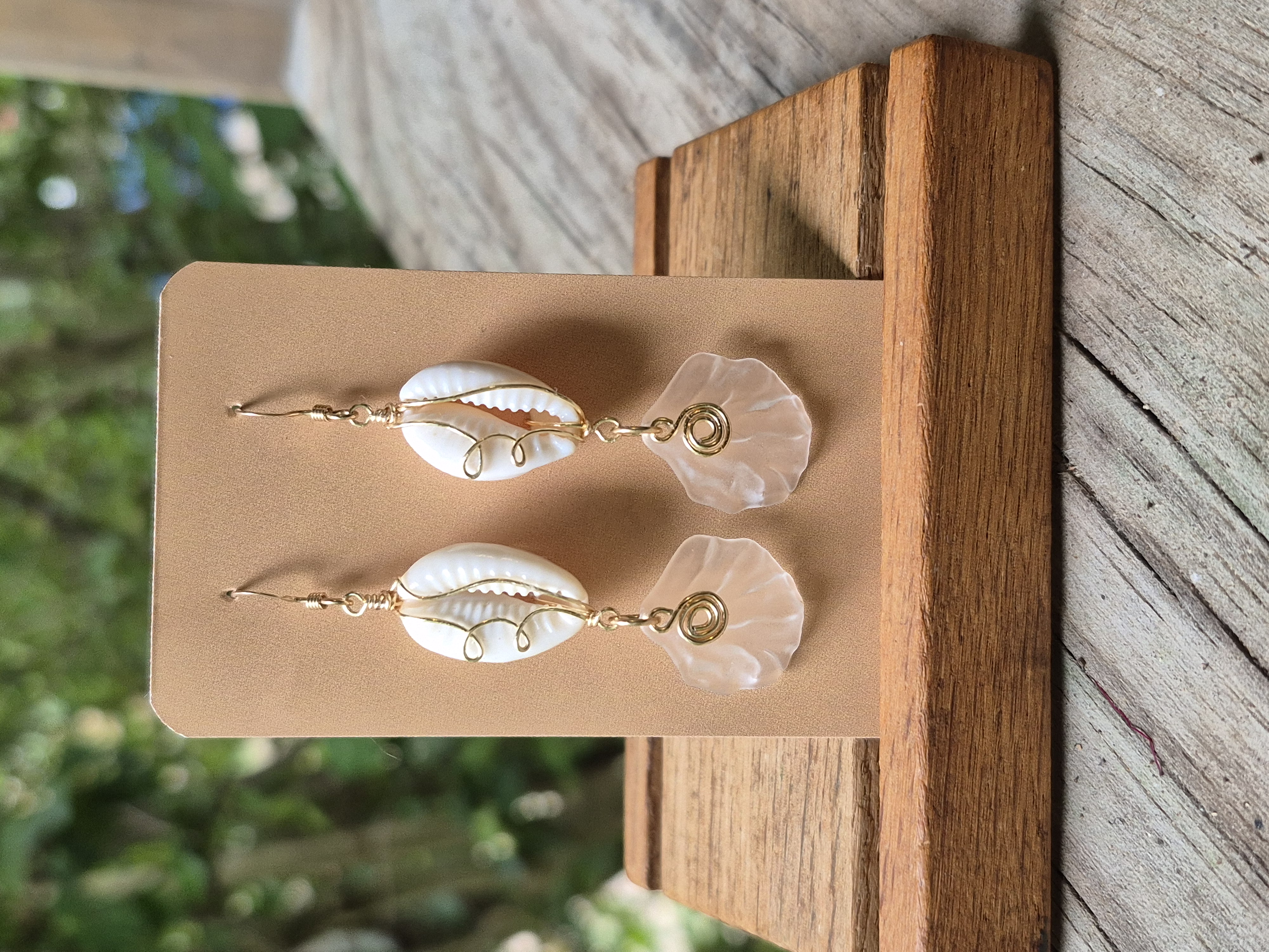 Gold wire wrapped cowrie earrings