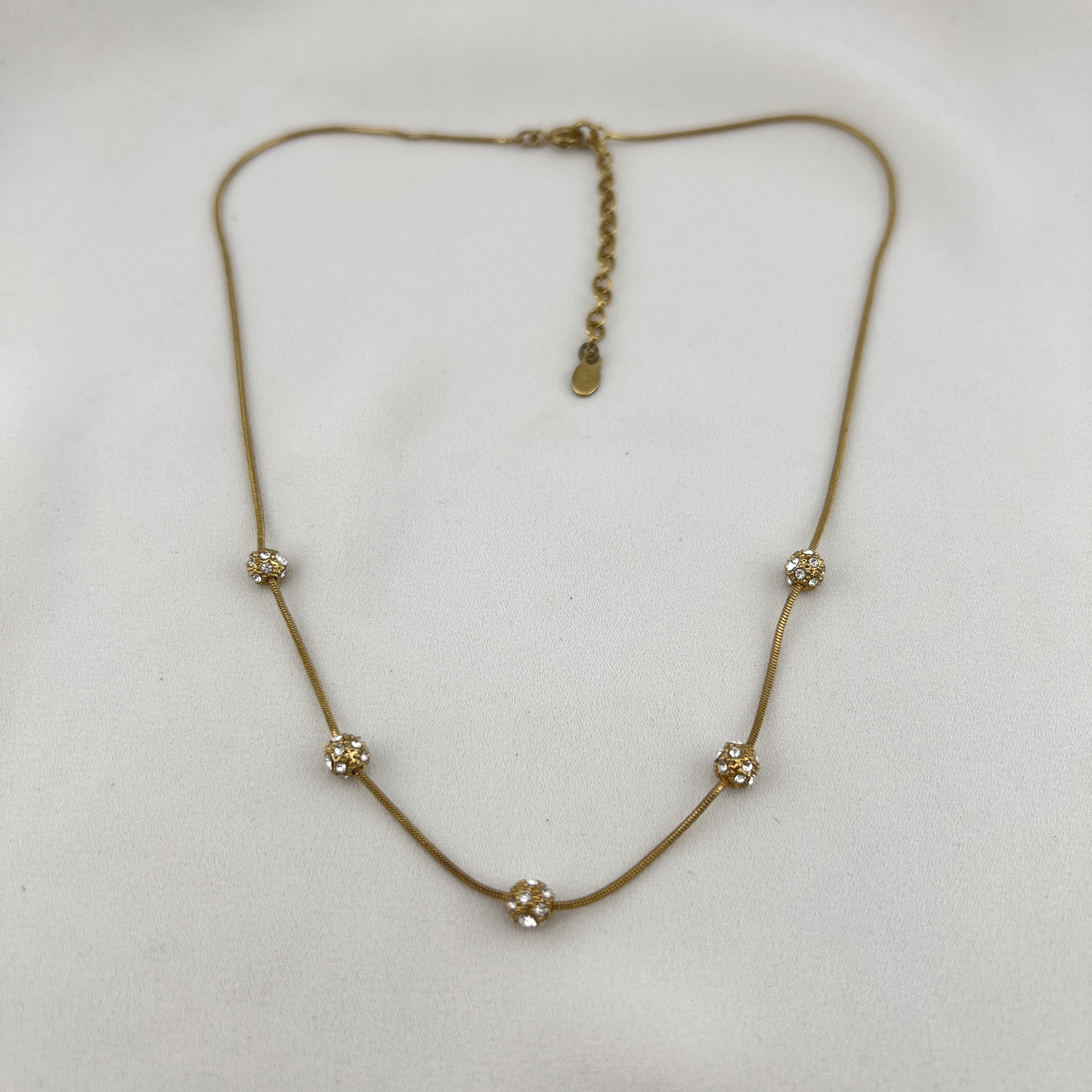 Aukso spalvos Monet vėrinys su kristalų burbuliukais