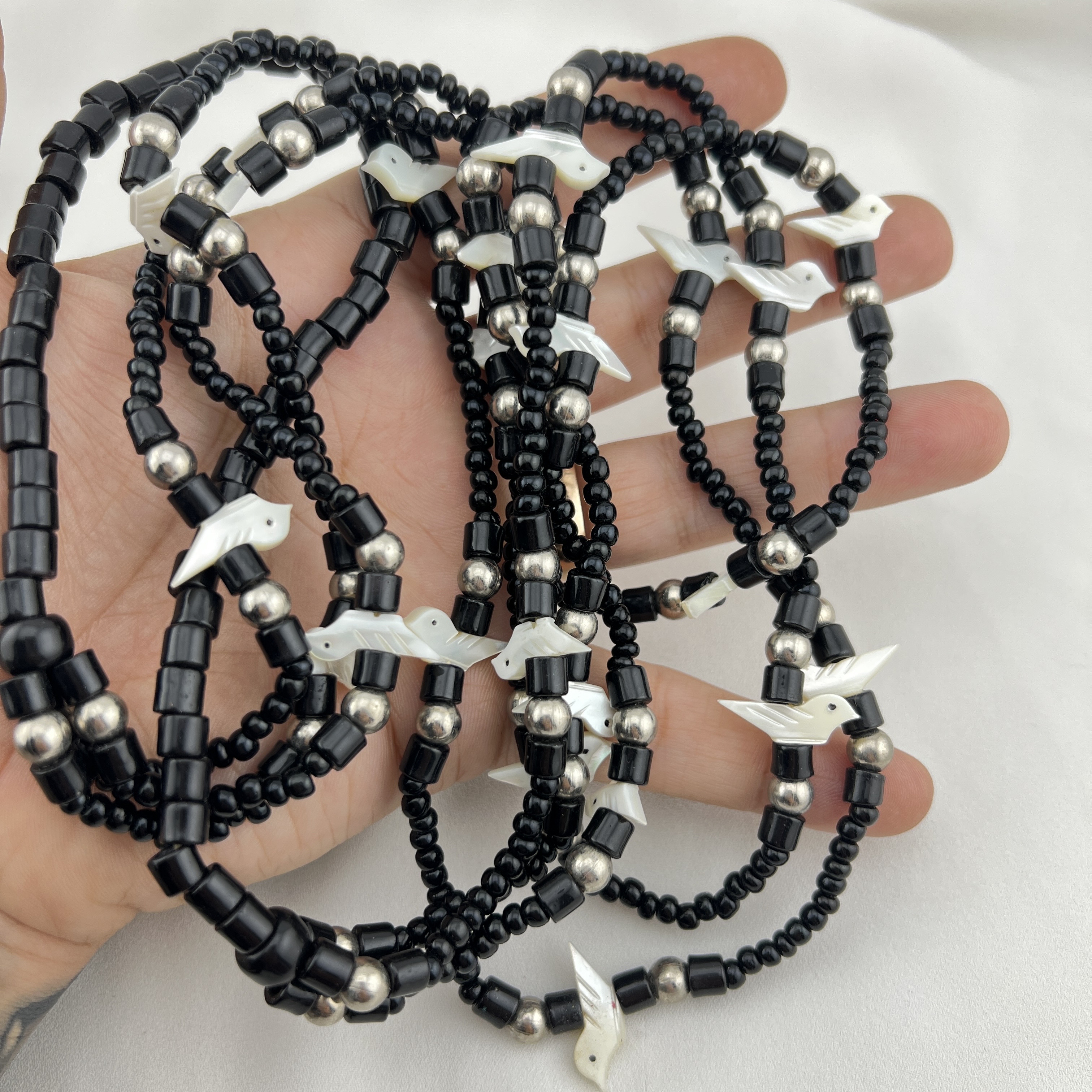 Vintažinis trijų eilių vėrinys su perlamutro paukšteliais