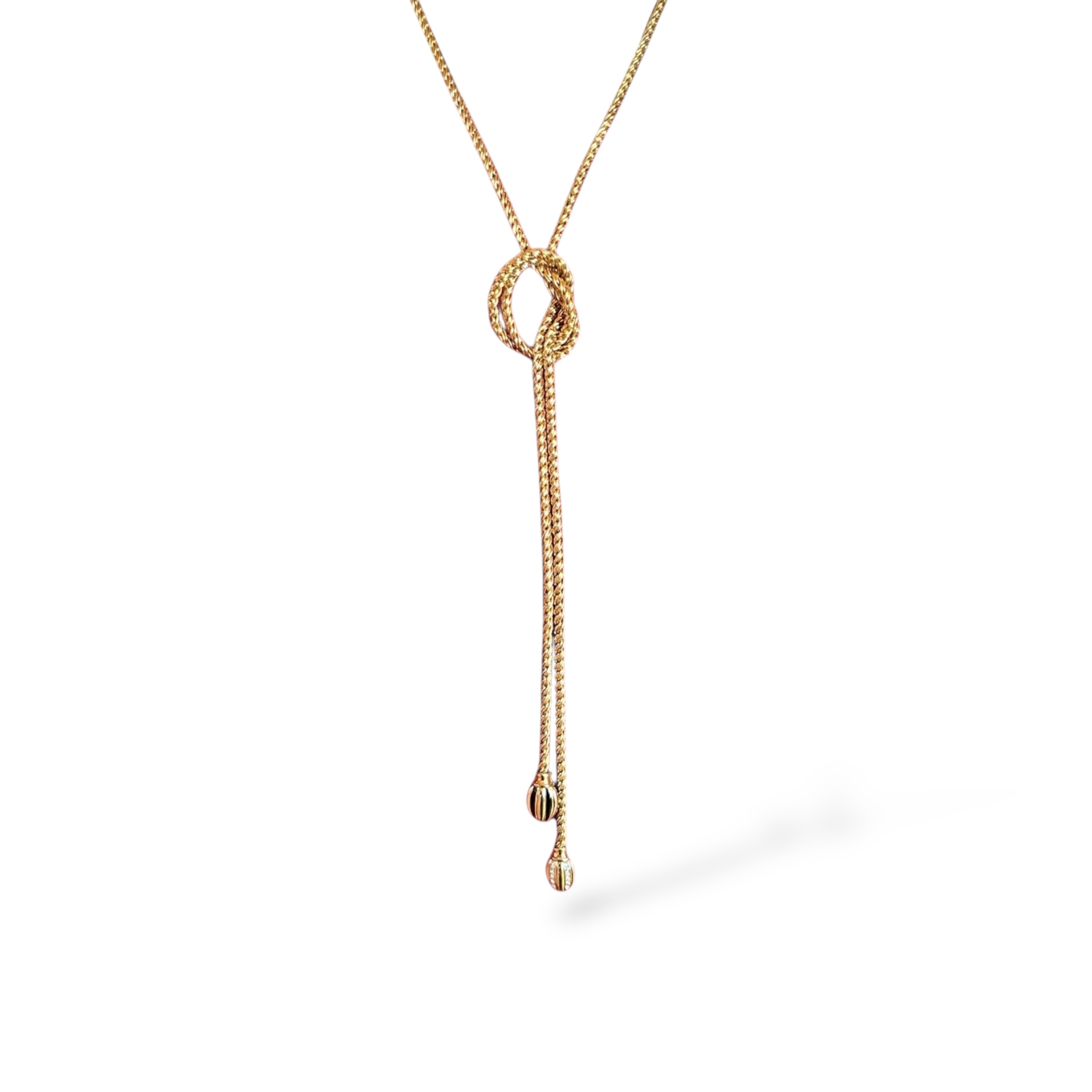 Vintažinis auksinės spalvos „lariat“ tipo kaklo papuošalas  ~1980–1990 m.