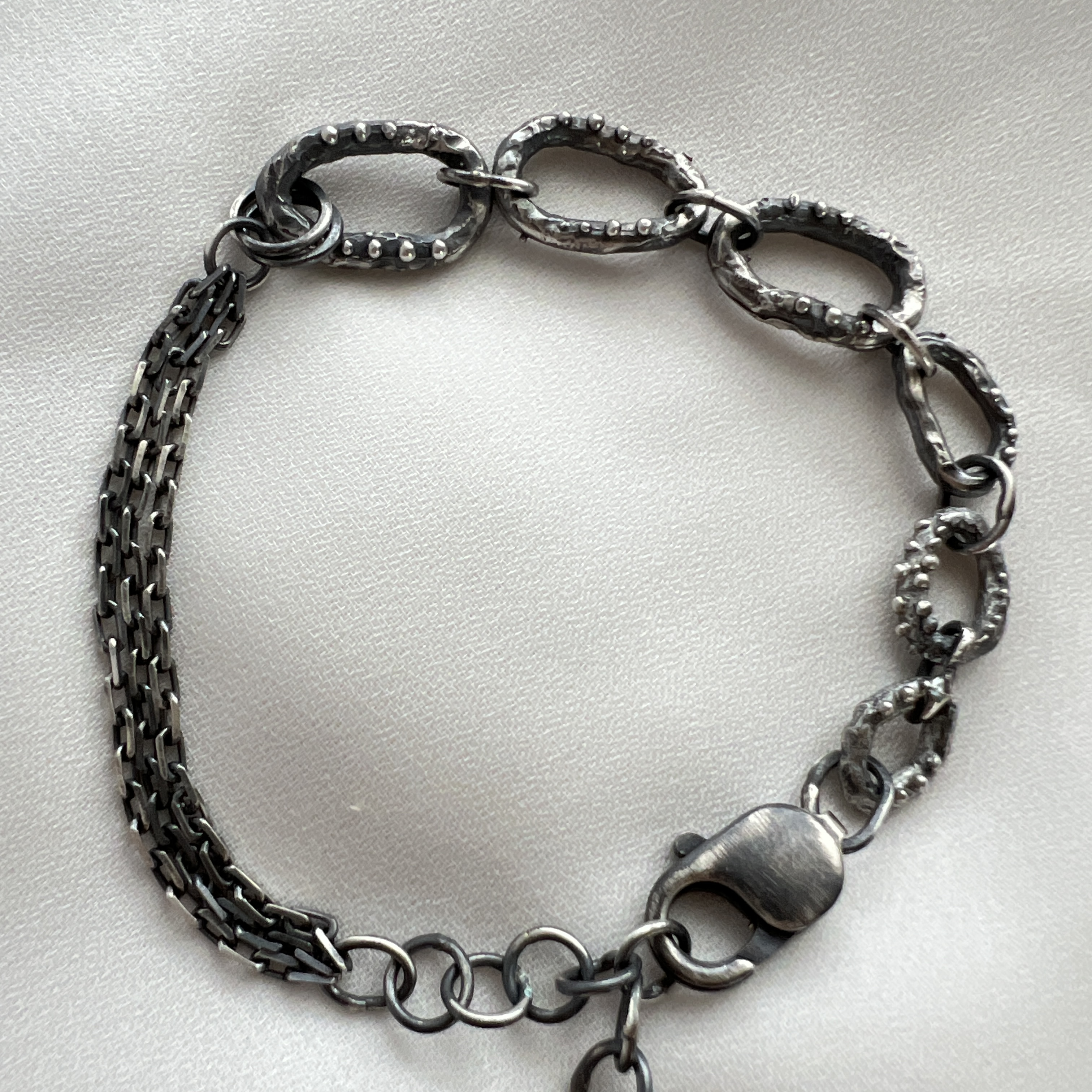 Rankų darbo oksiduoto sidabro grandinėlės apyrankė su žvaigždės pakabuku