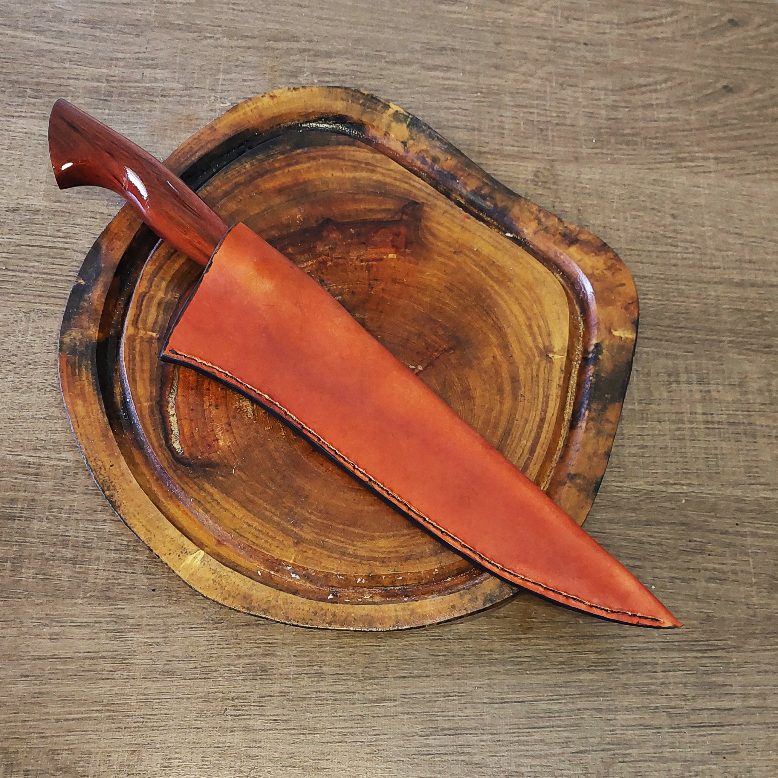 Faca Picanheira em aço inox com abridor.