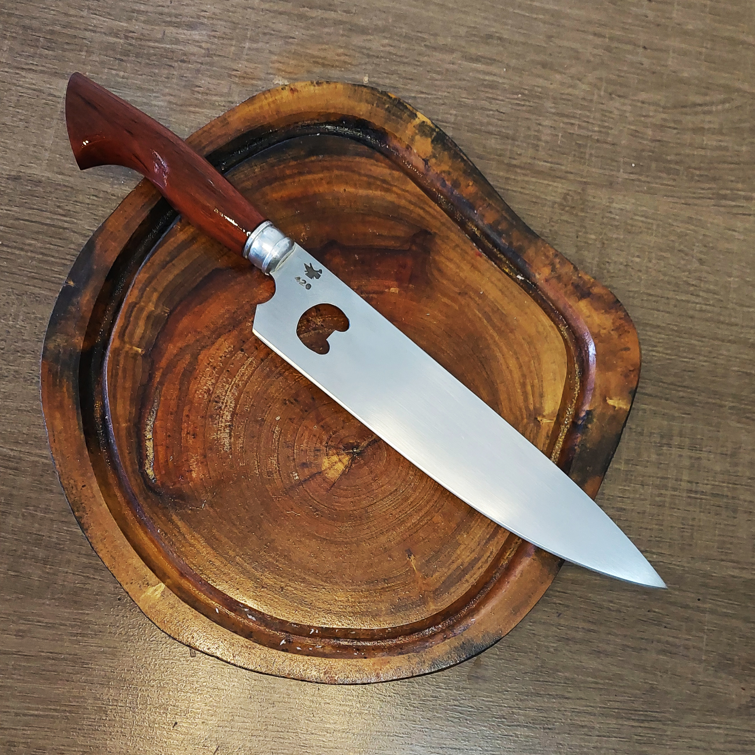 Faca Picanheira em aço inox com abridor.