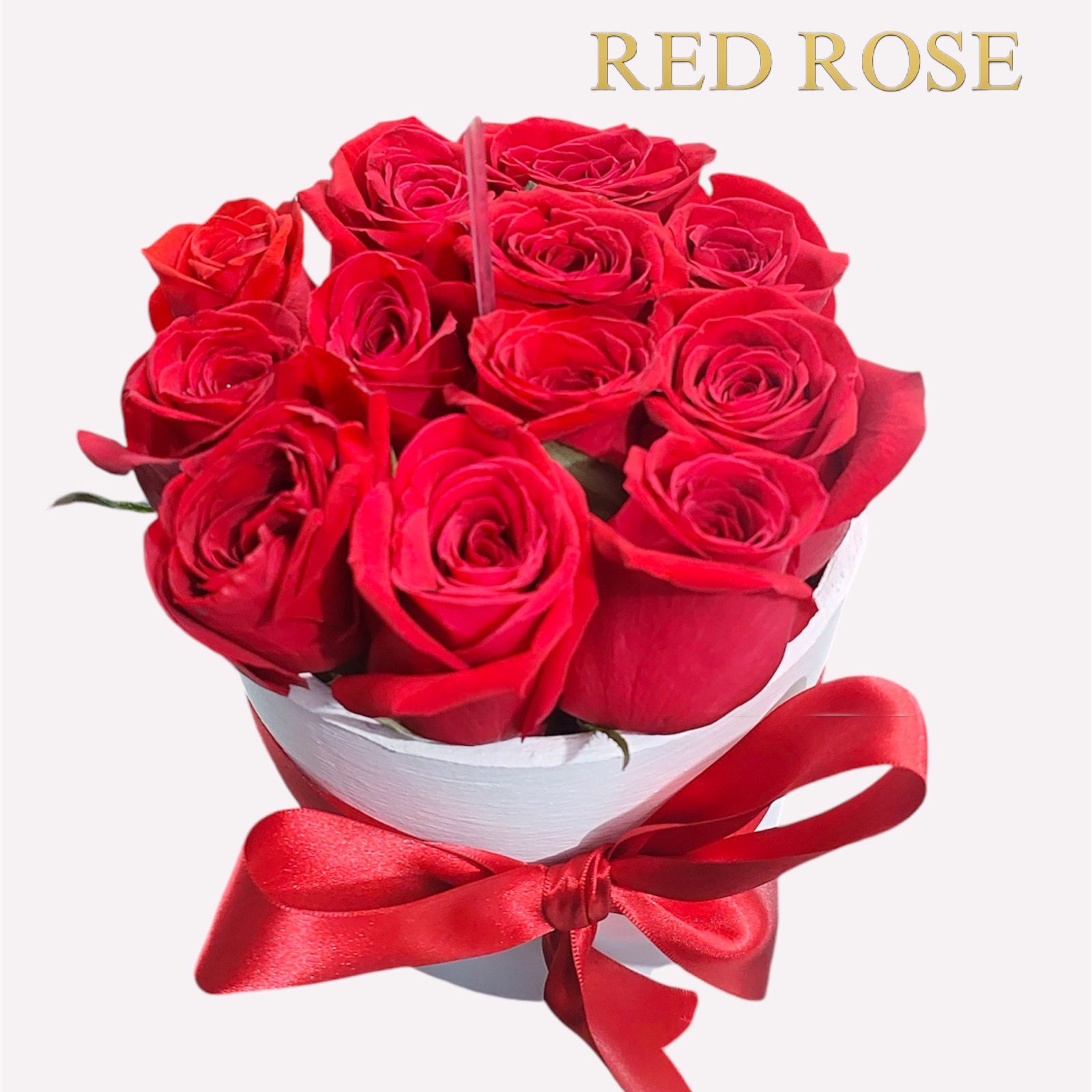 Mini cajita con 12 rosas rojas